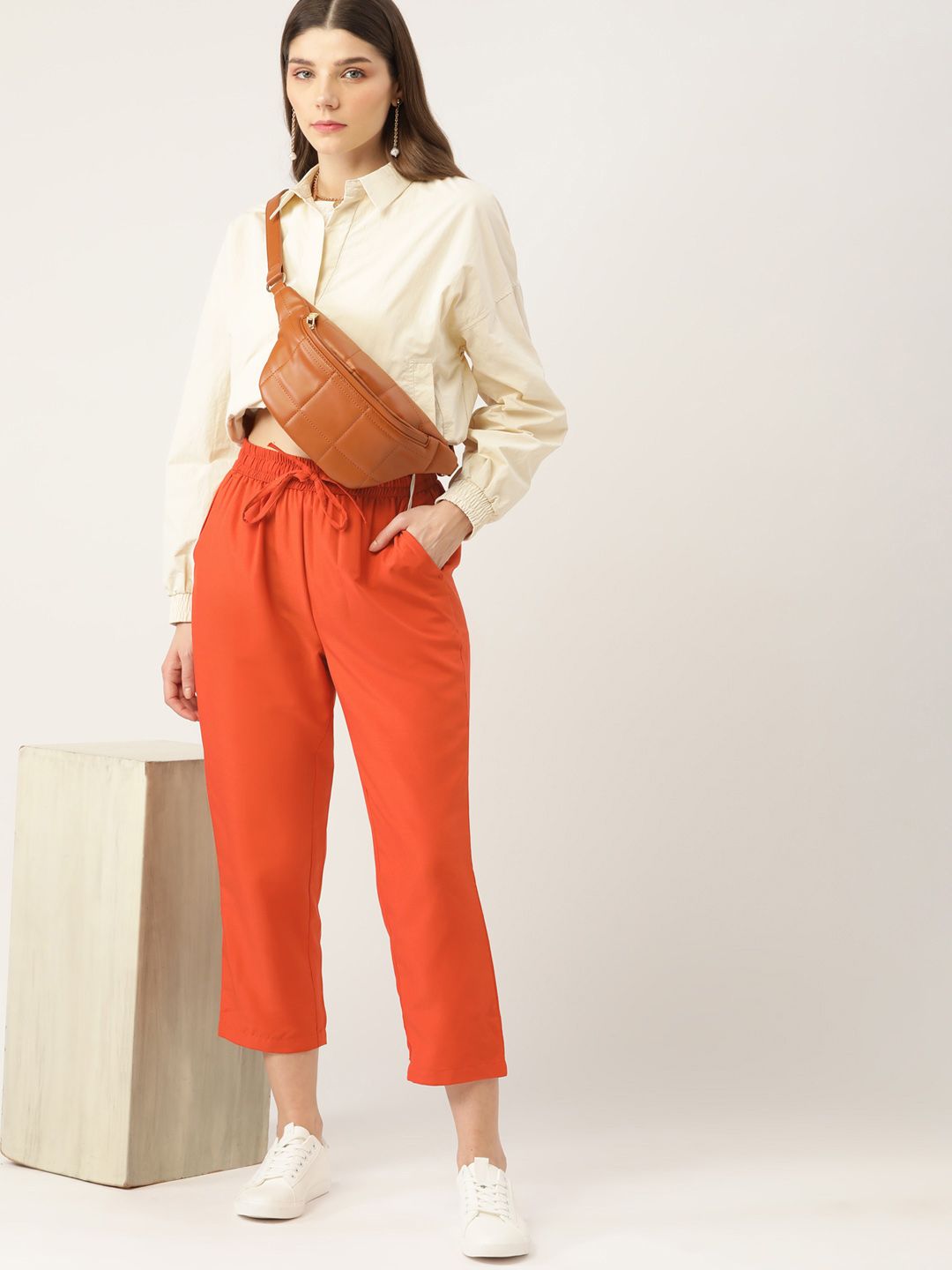DressBerry Women Orange Regular Crop Trousers Price in India