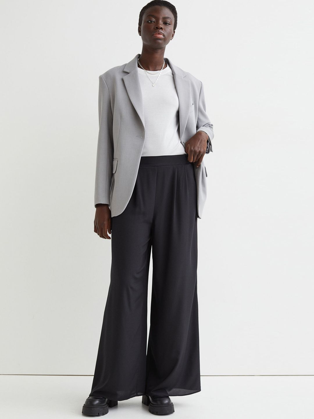 H&M Women Black Solid Wide Trousers Price in India