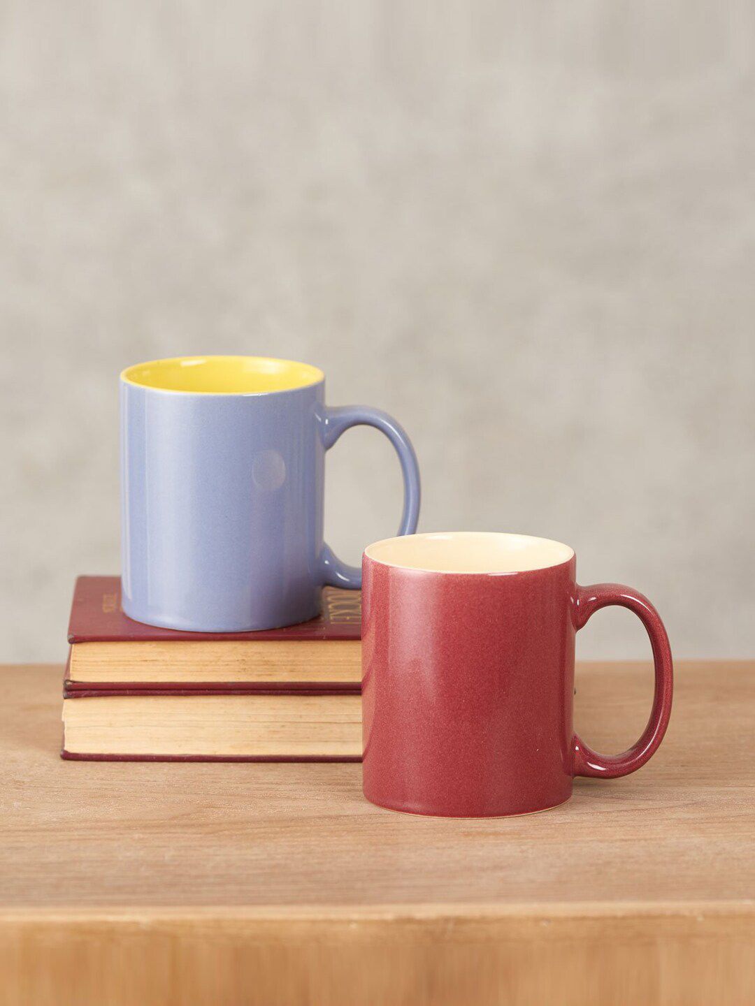 THEDECORKART Set Of 2 Lavender & Maroon Solid Ceramic Glossy Mugs Price in India