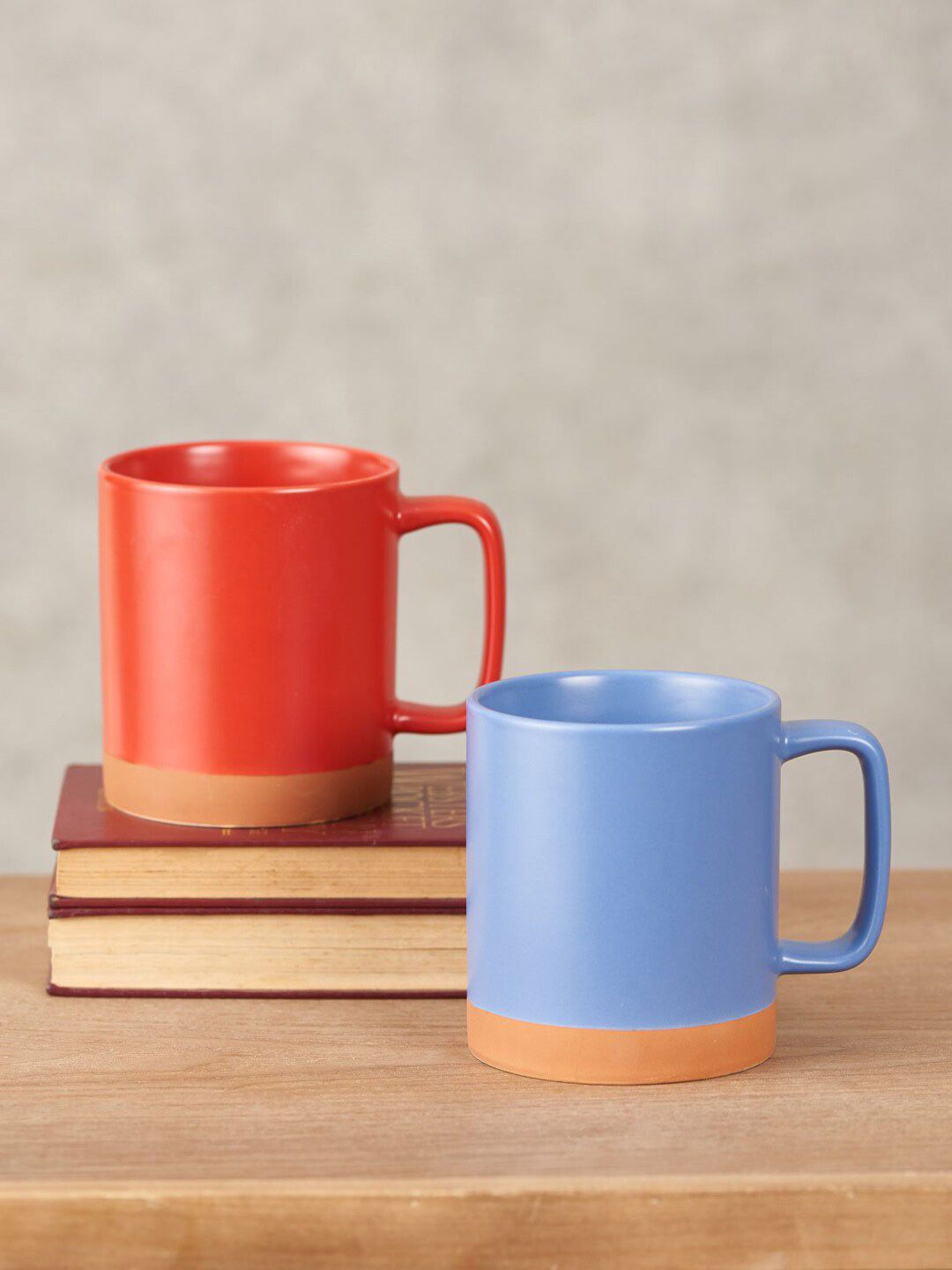 THEDECORKART Set-2 Red & Blue Solid Ceramic Glossy Cups and Mugs Price in India