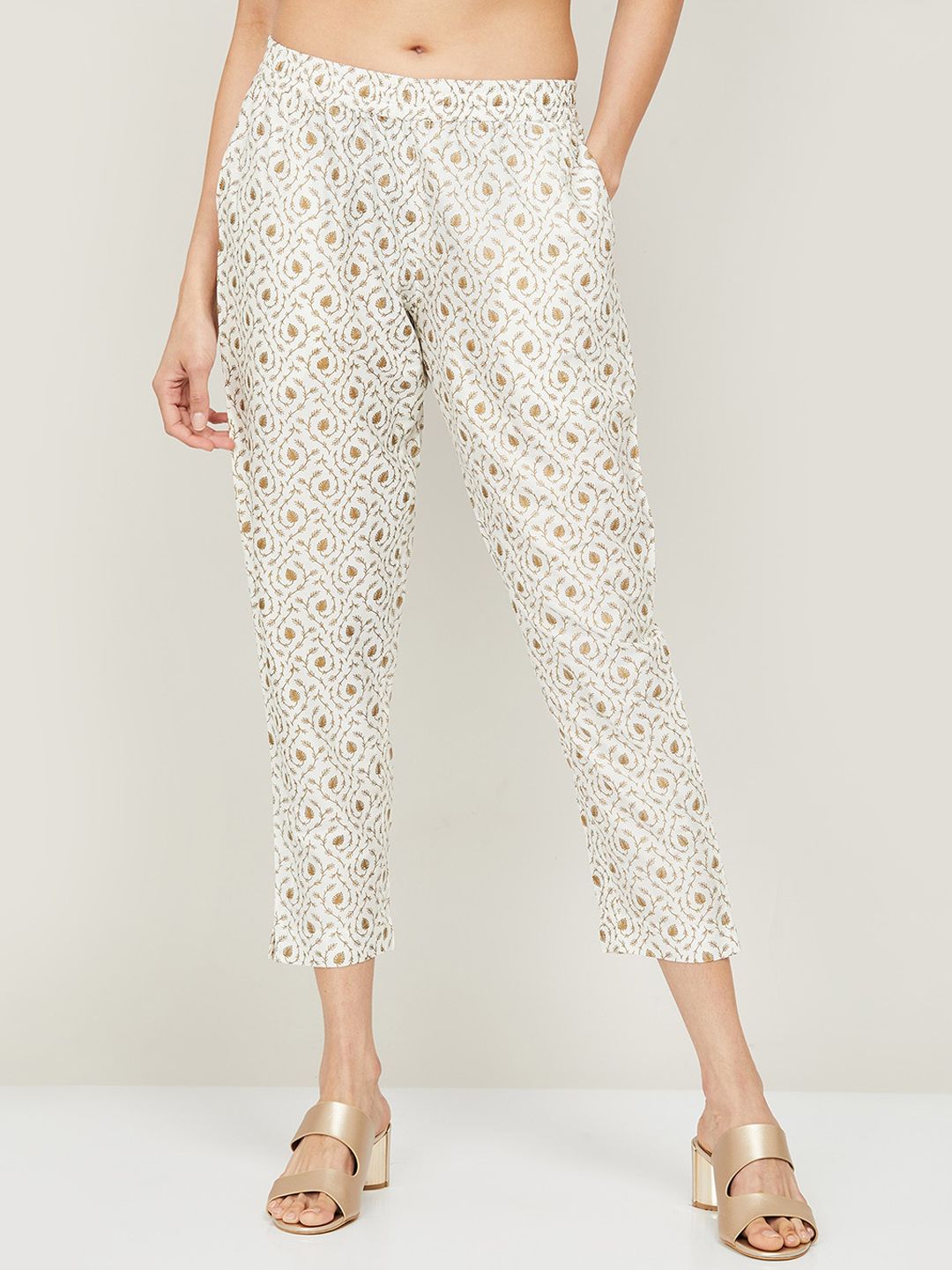 Melange by Lifestyle Women Off White Floral Printed Trousers Price in India