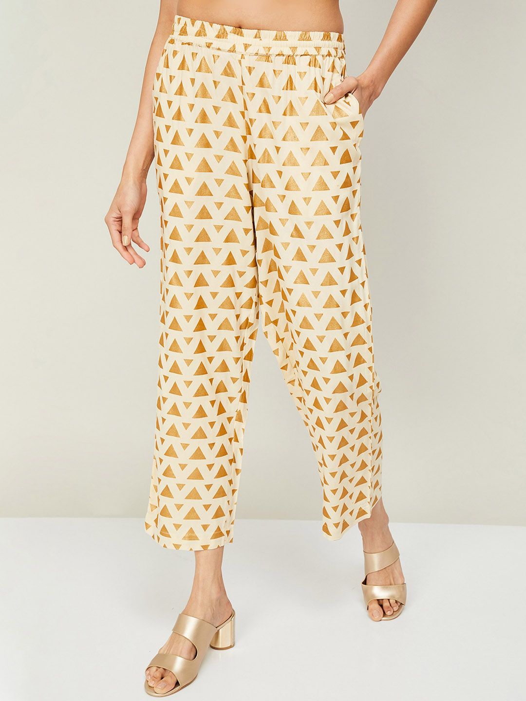 Melange by Lifestyle Women White & Gold-Toned Printed Knitted Cropped Ethnic Palazzos Price in India