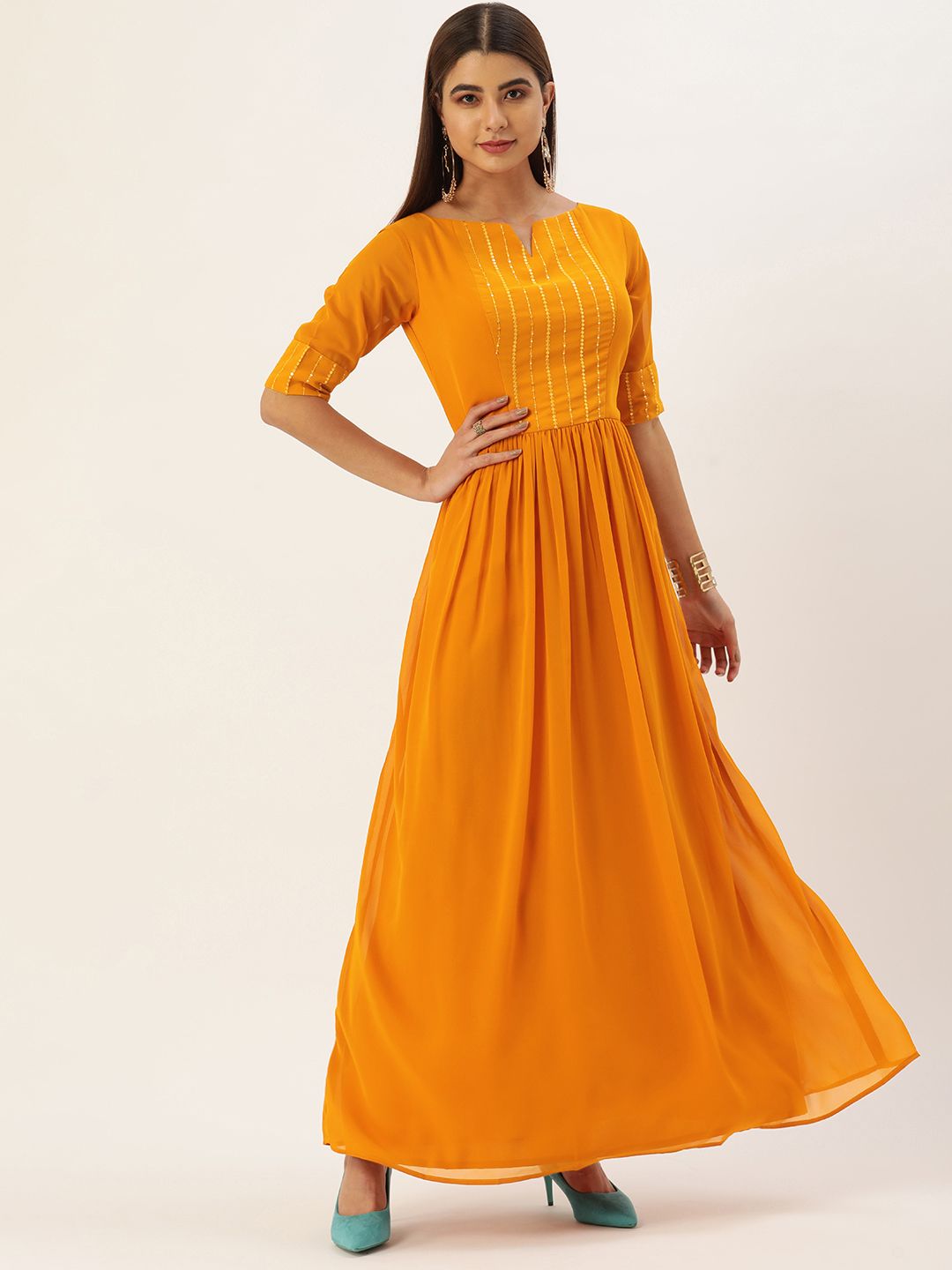 EthnoVogue Mustard Yellow Embellished Boat Neck Pleated Made To Measure Georgette Maxi Price in India