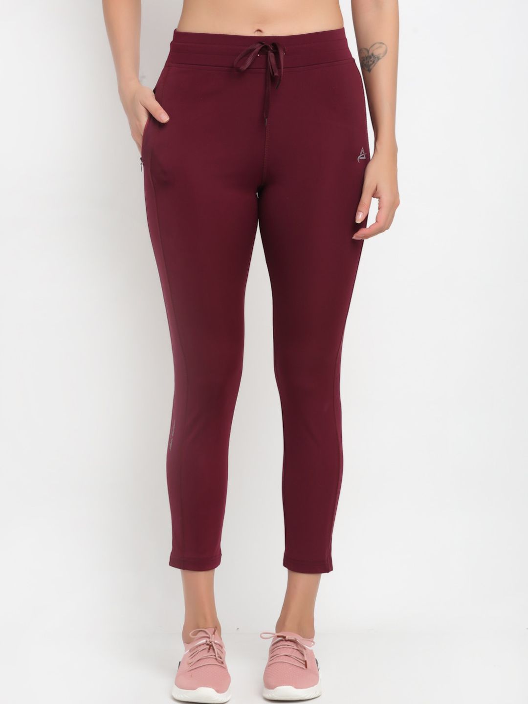ANTI CULTURE Women Maroon Solid Tights Price in India