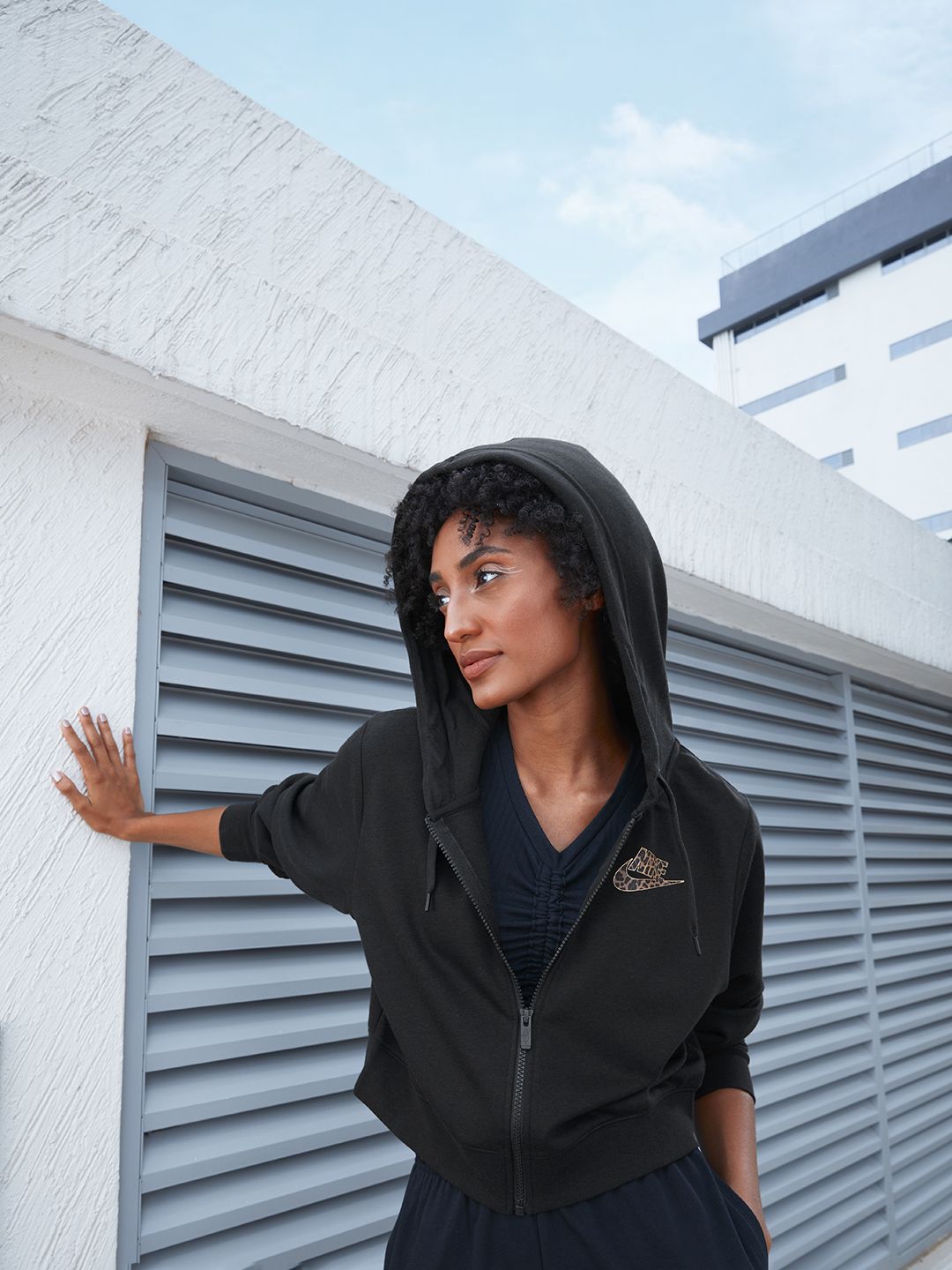 Nike Women Black Solid Cropped Hooded Sweatshirt Price in India