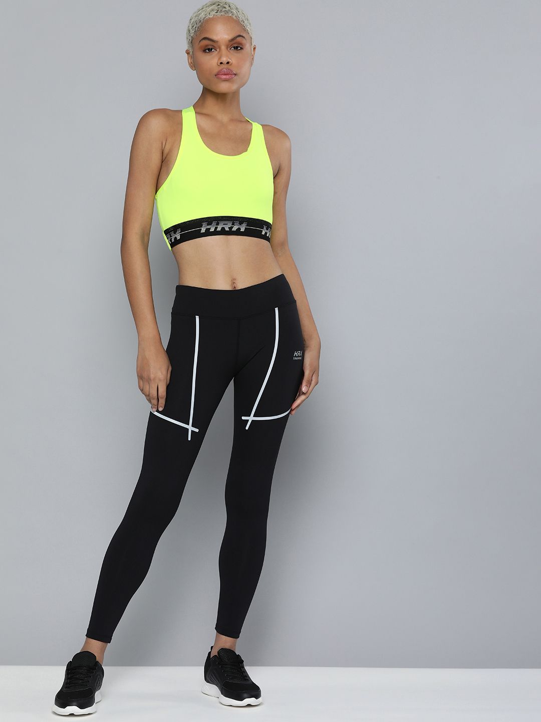 HRX by Hrithik Roshan Training Women Neon Lime Rapid-Dry Solid Sports Bra Price in India