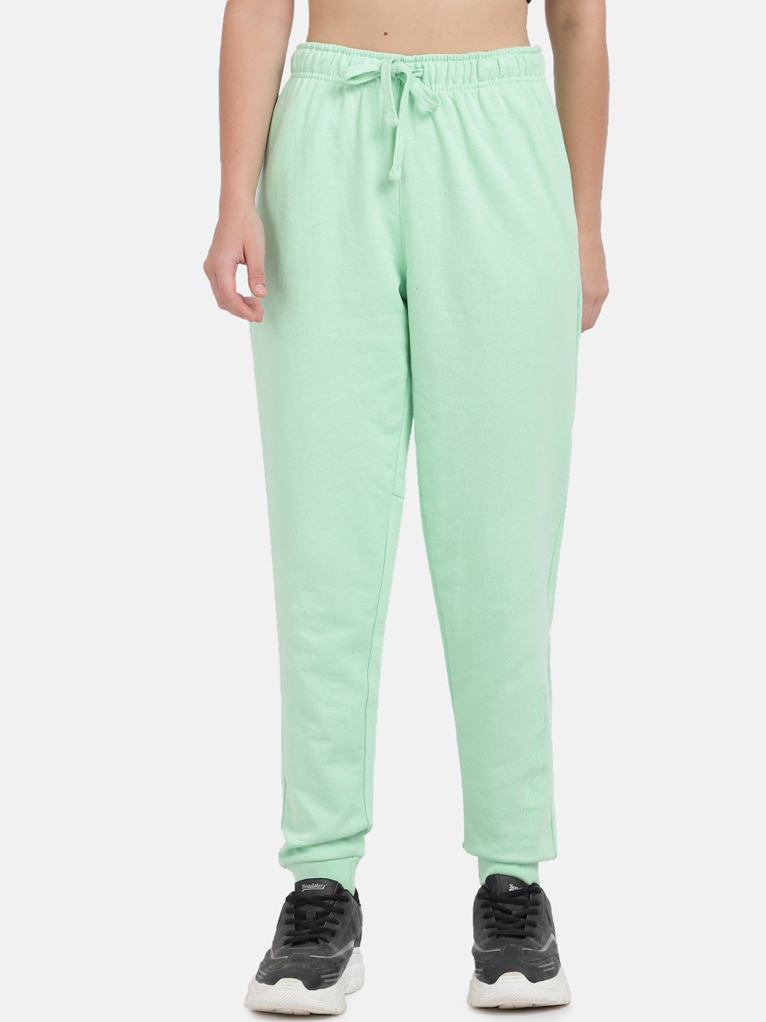 Head Women Sea Green Solid Joggers Price in India