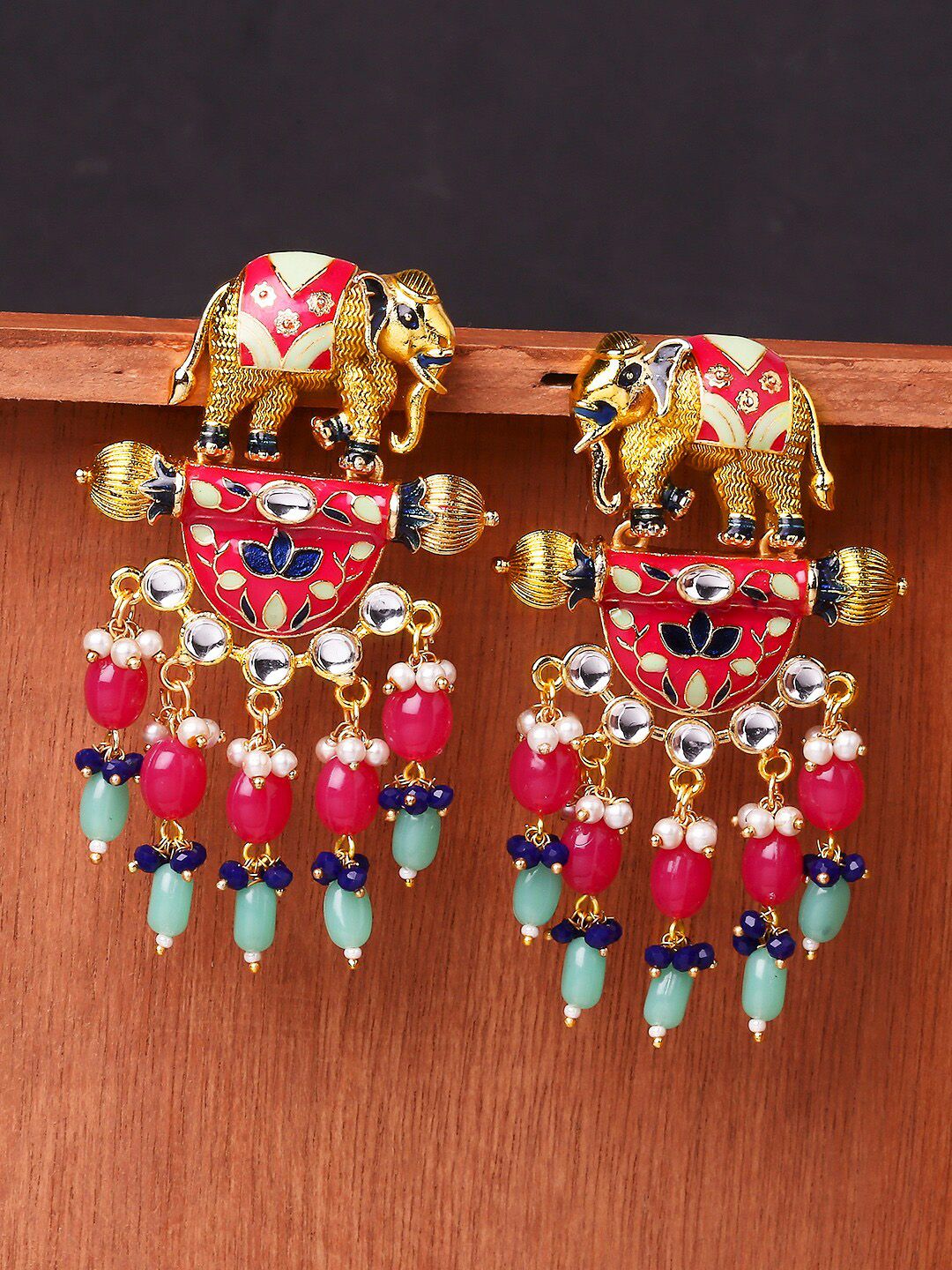 OOMPH Red Animal Shaped Chandbalis Earrings Price in India