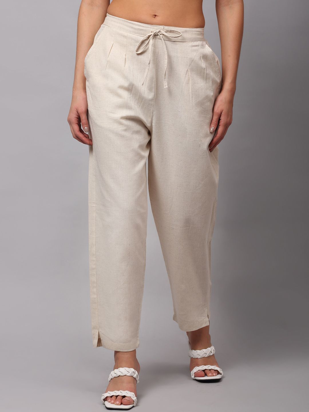 NEUDIS Women Beige Flared Trousers Price in India