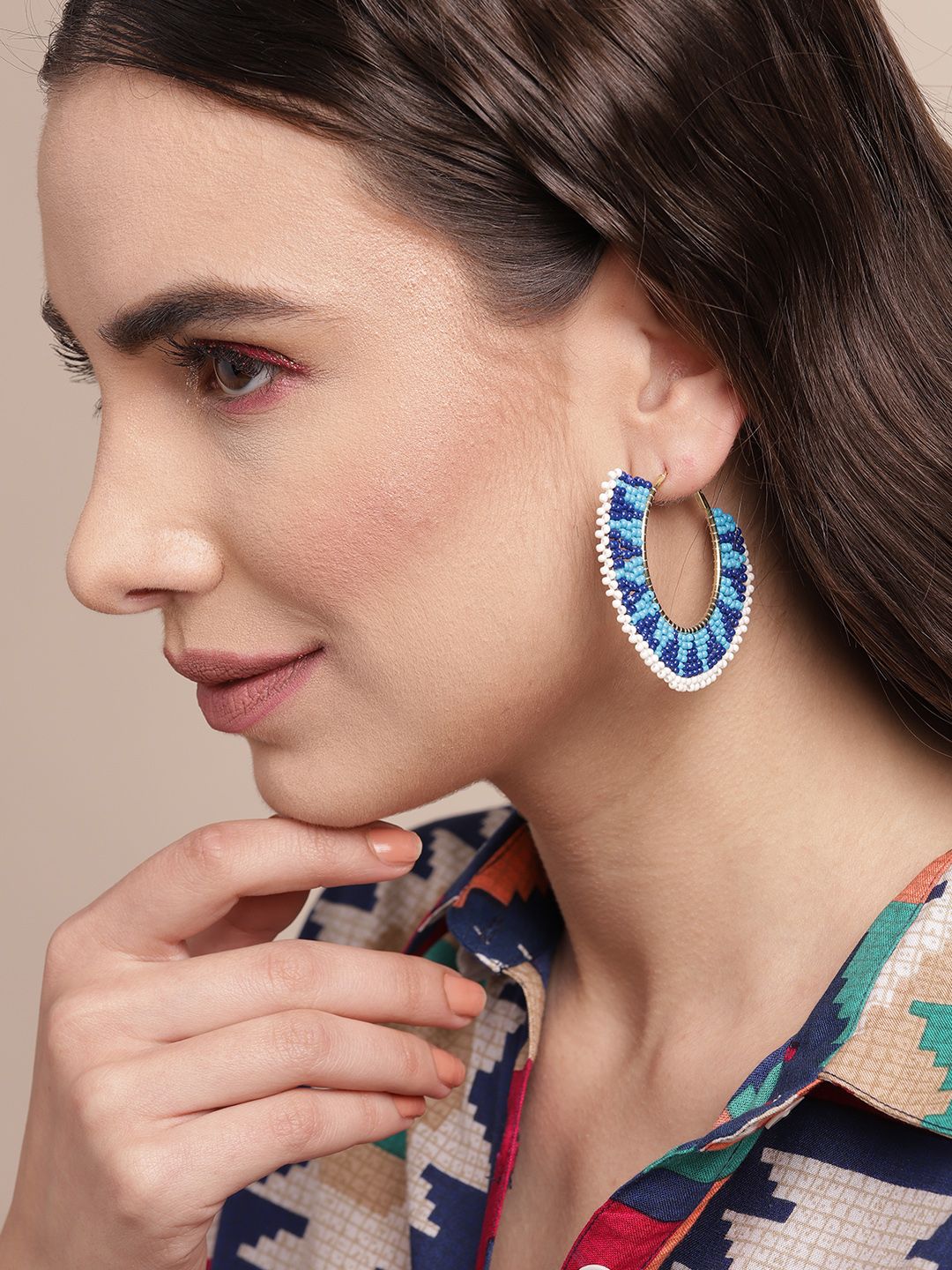Sangria Blue & White Beaded Crescent Shaped Half Hoop Earrings Price in India