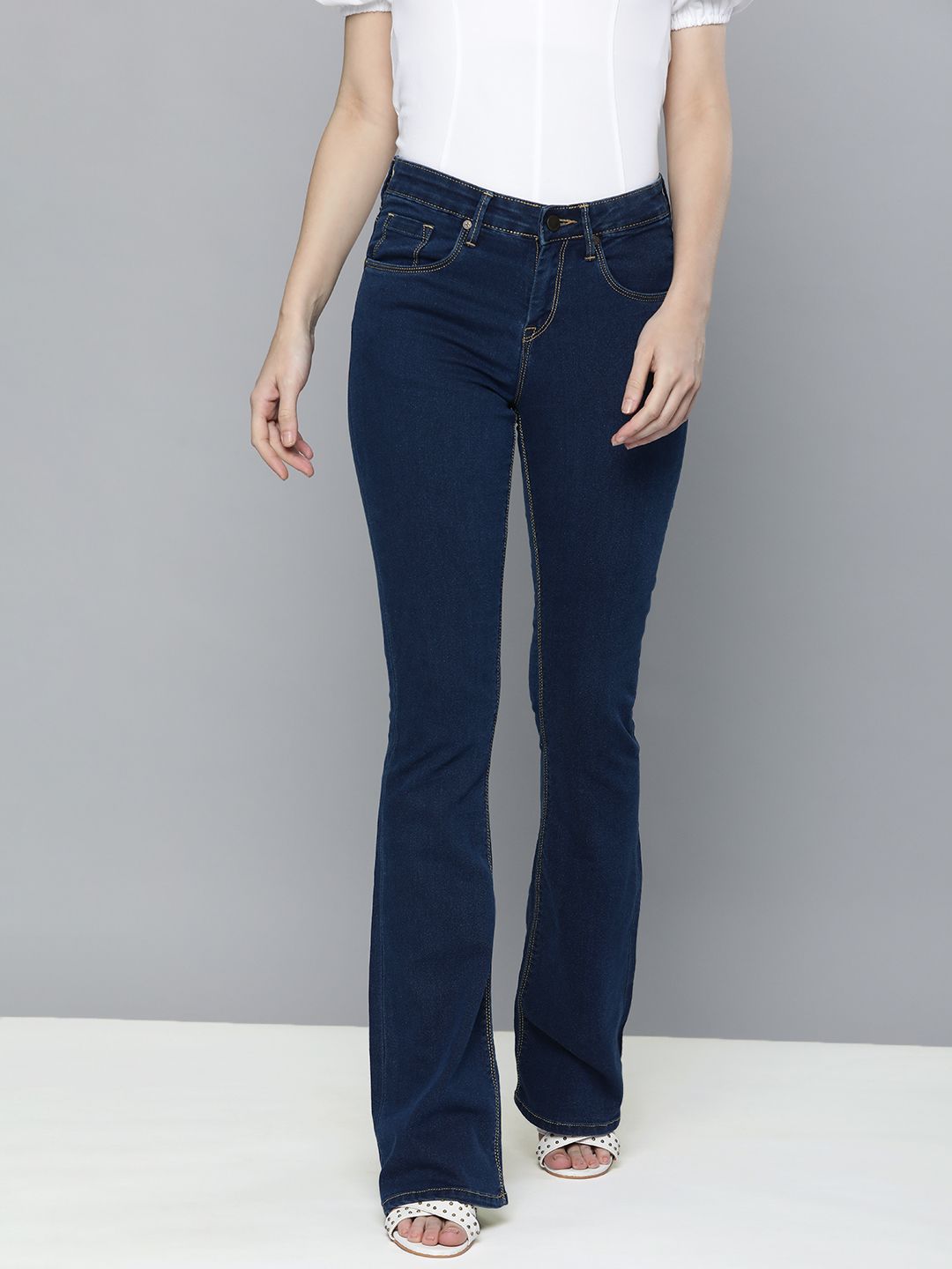 HERE&NOW Women Navy Blue Bootcut Mid-Rise Clean Look Jeans Price in India
