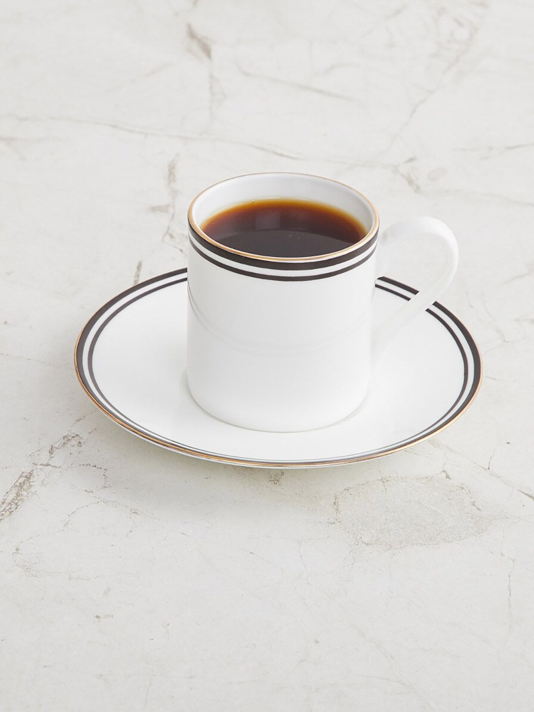 Home Centre White & black Solid Bone China Espresso Cup and Saucer Price in India