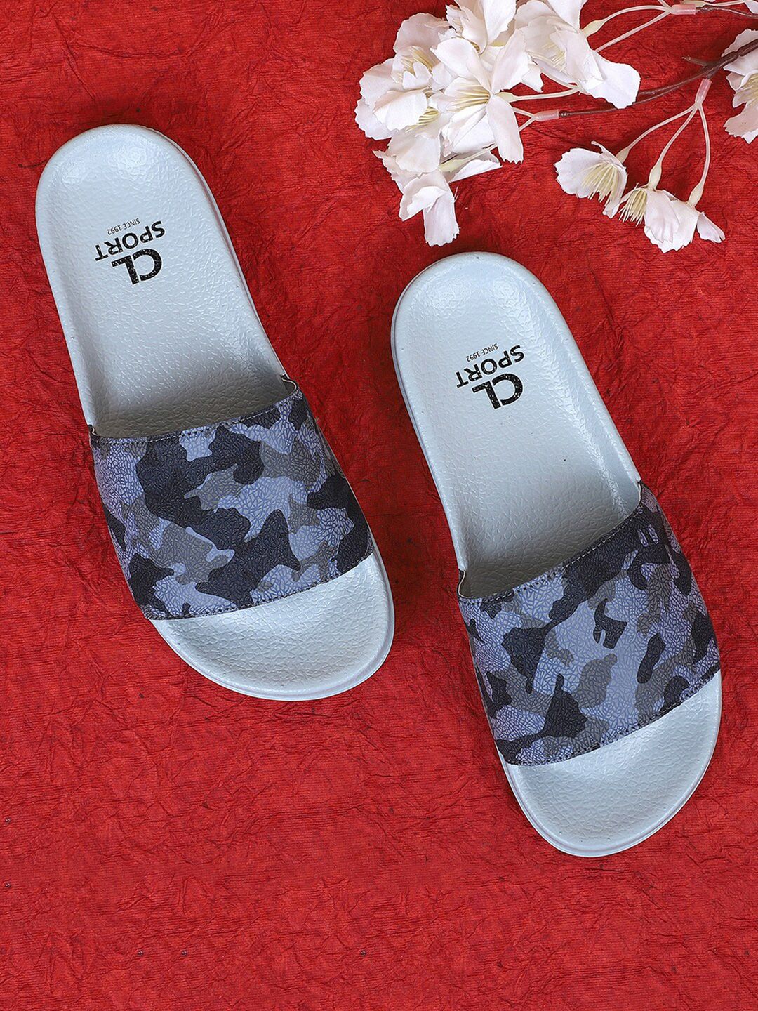 Carlton London sports Women Blue & Black Printed Sliders Price in India