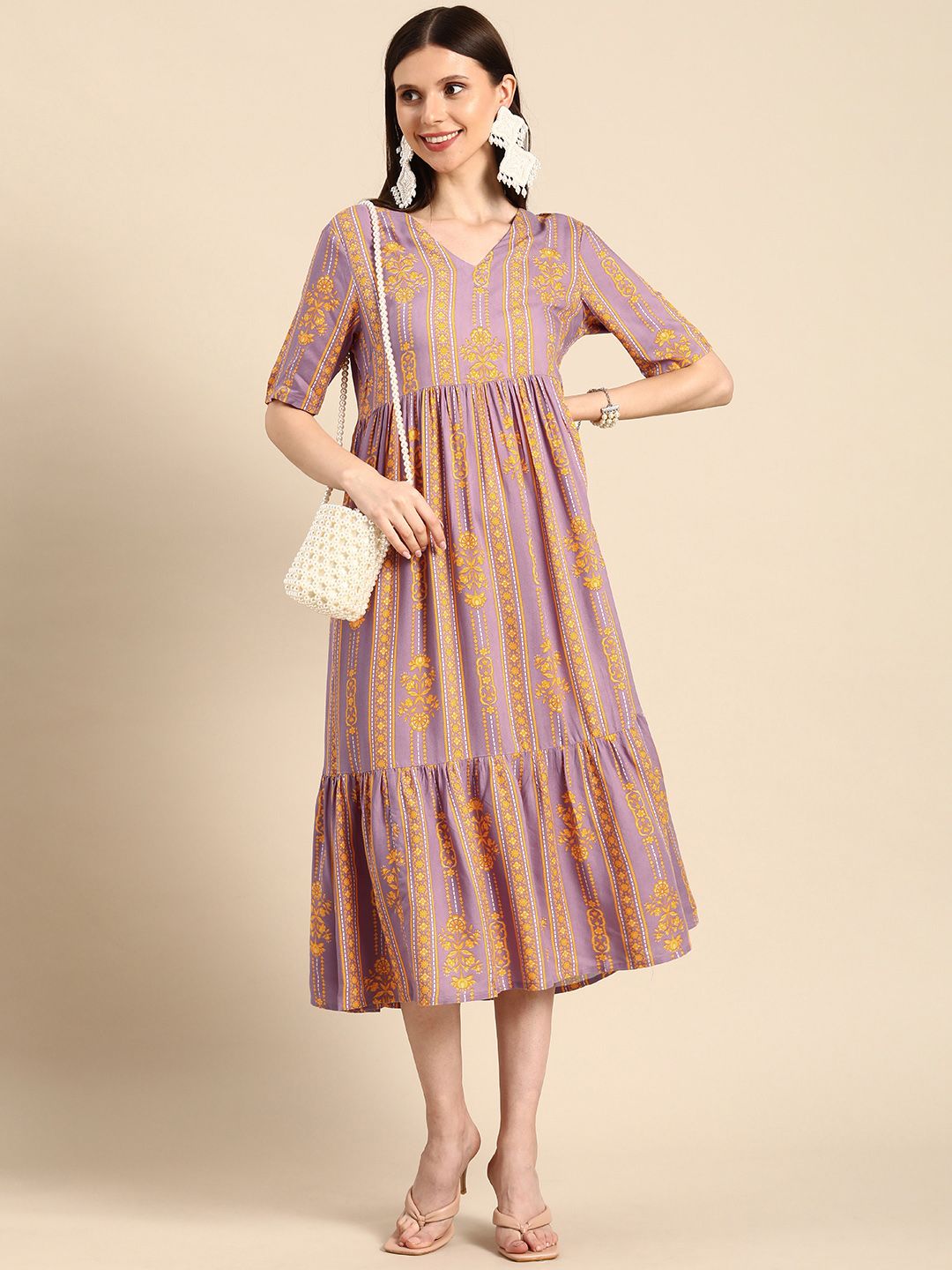 Anouk Mauve & Yellow Ethnic Motifs Tie-Up Neck A-Line Maxi Dress Price in India