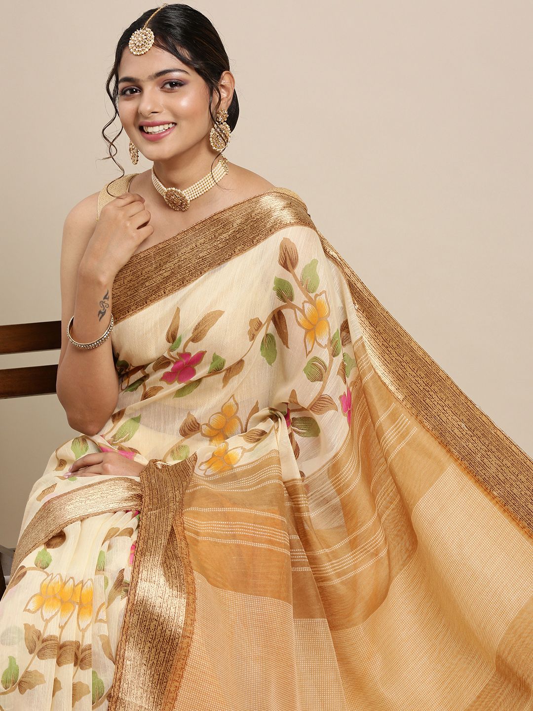 Mitera Beige & Green Floral Pure Georgette Saree Price in India