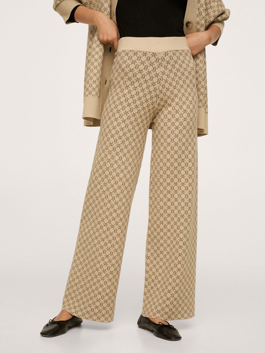 MANGO Women Beige Geometric Printed Flared High-Rise Trousers Price in India