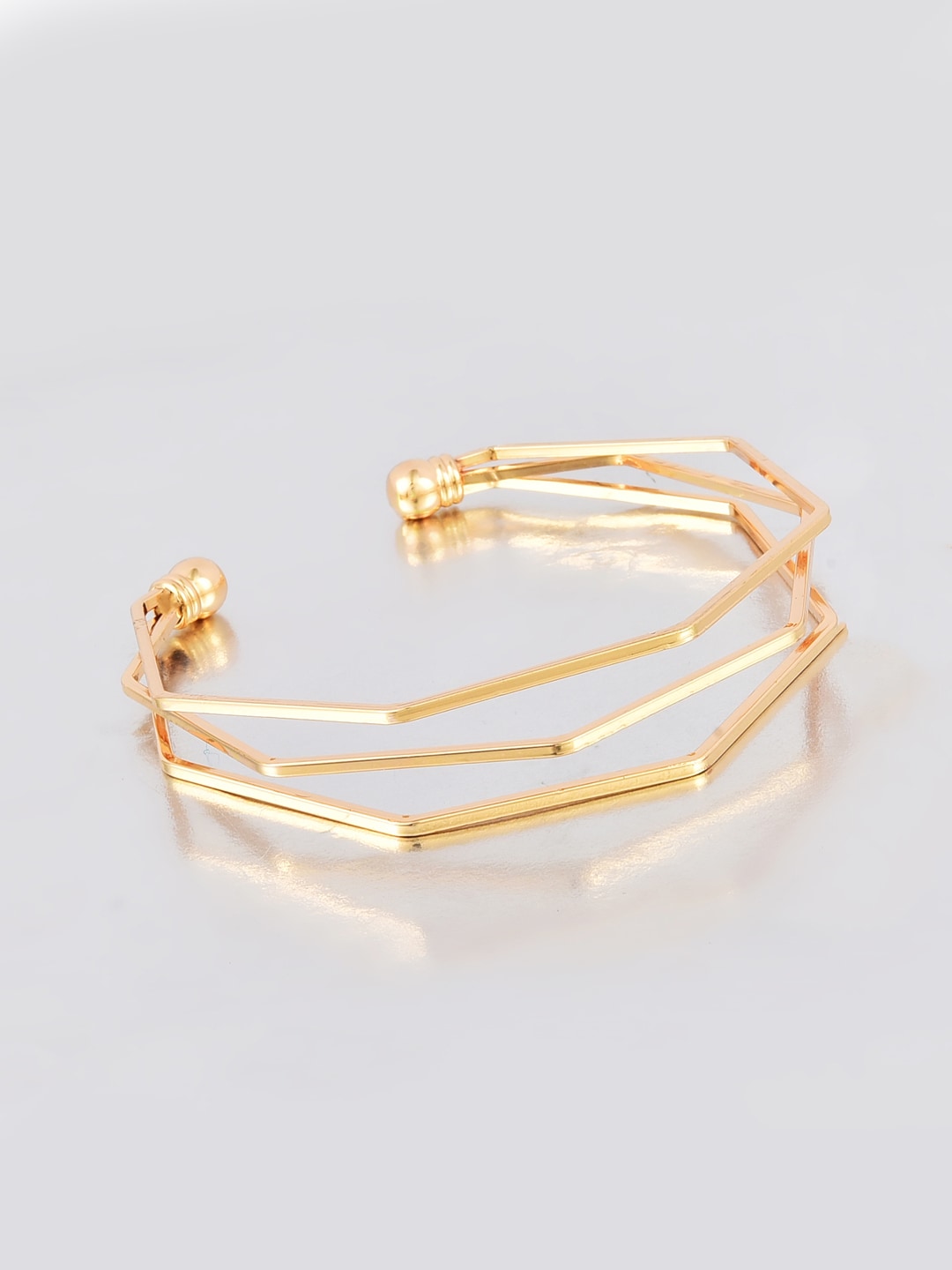 Yellow Chimes Women Gold-Toned Gold-Plated Cuff Bracelet Price in India