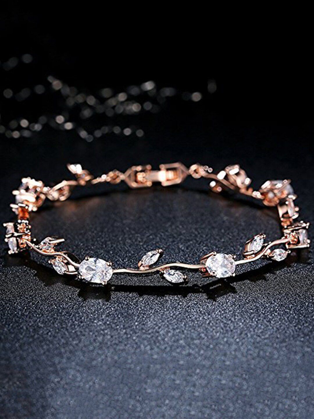 Yellow Chimes Women Rose Gold white Crystals studded Bracelet Price in India