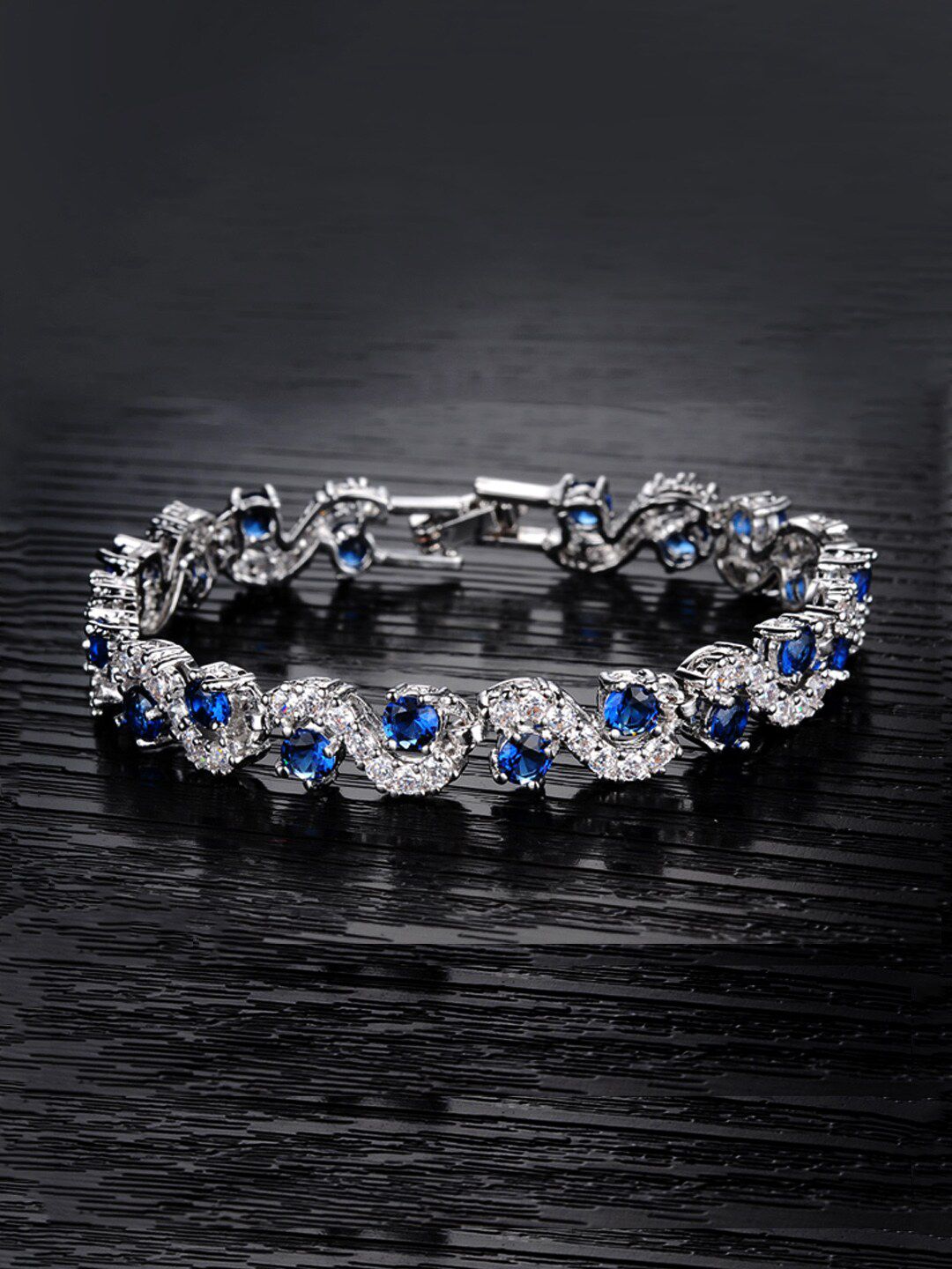 Yellow Chimes Women White & Blue Crystals Rhodium-Plated Charm Bracelet Price in India