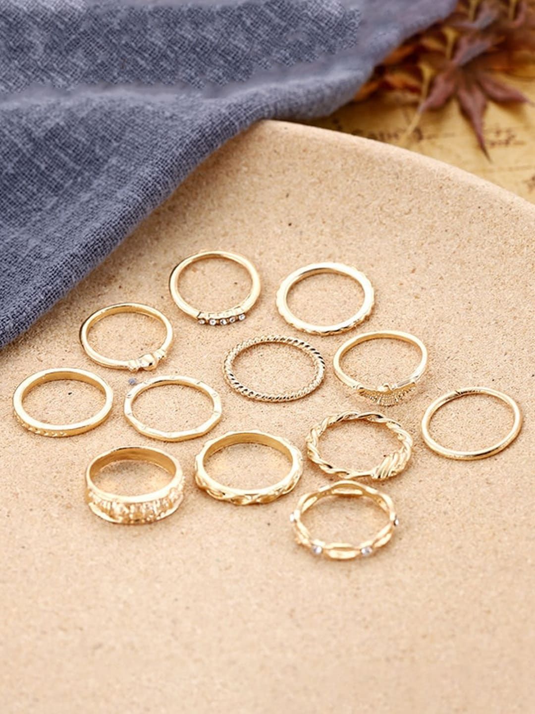 Yellow Chimes Set Of 12 Gold-Plated White Stone-Studded Finger Ring Price in India