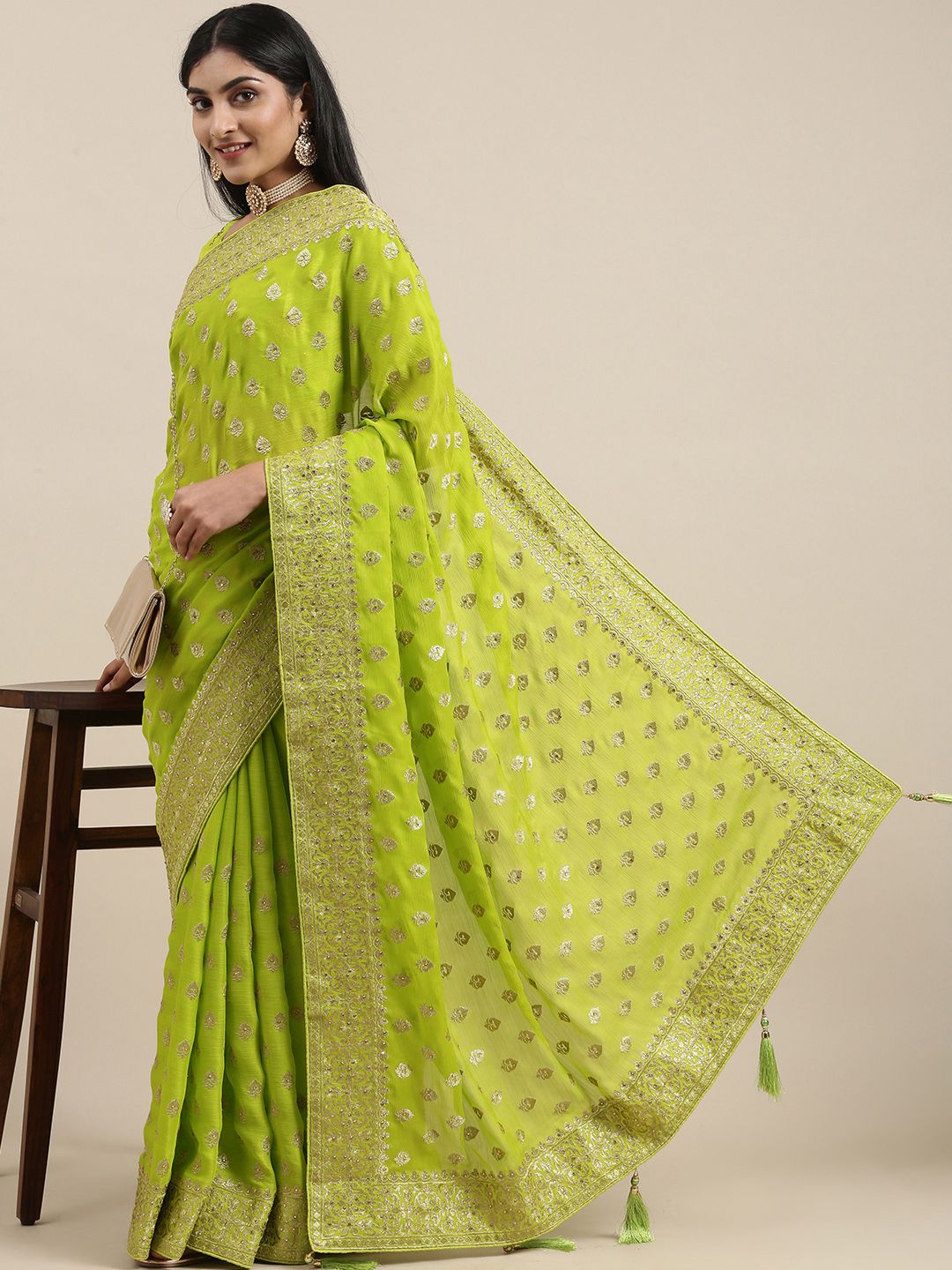 Mitera Green Ethnic Motifs Beads and Stones Satin Saree Price in India