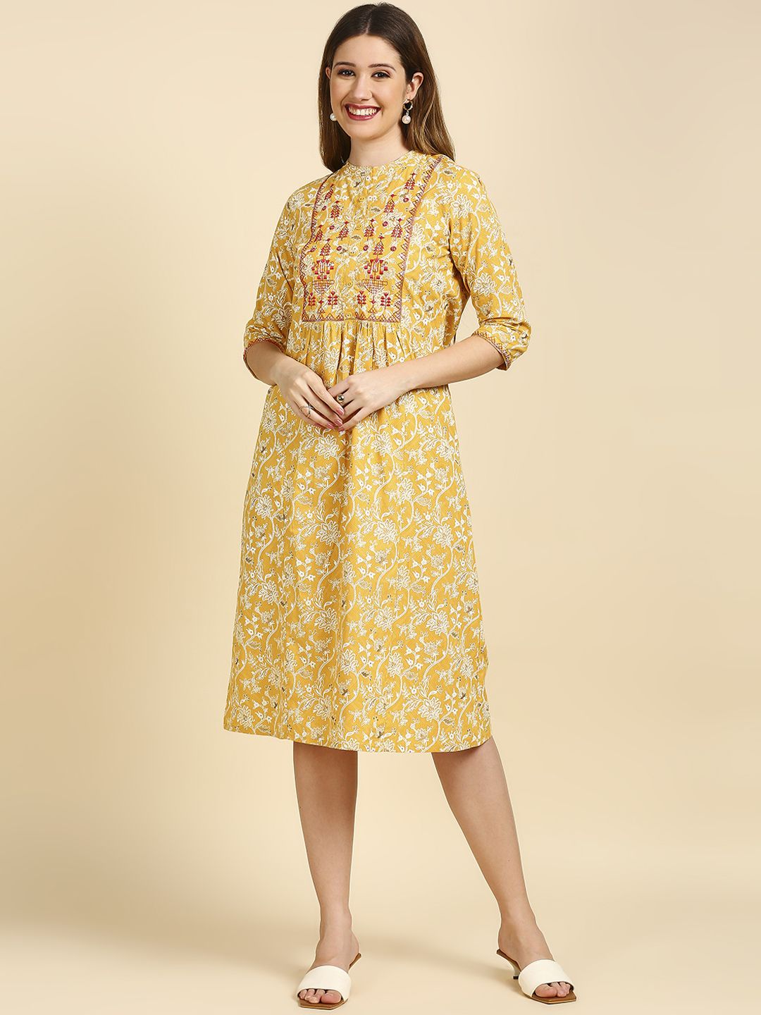 Anubhutee Yellow Cotton Floral Ethnic A-Line Midi Dress Price in India