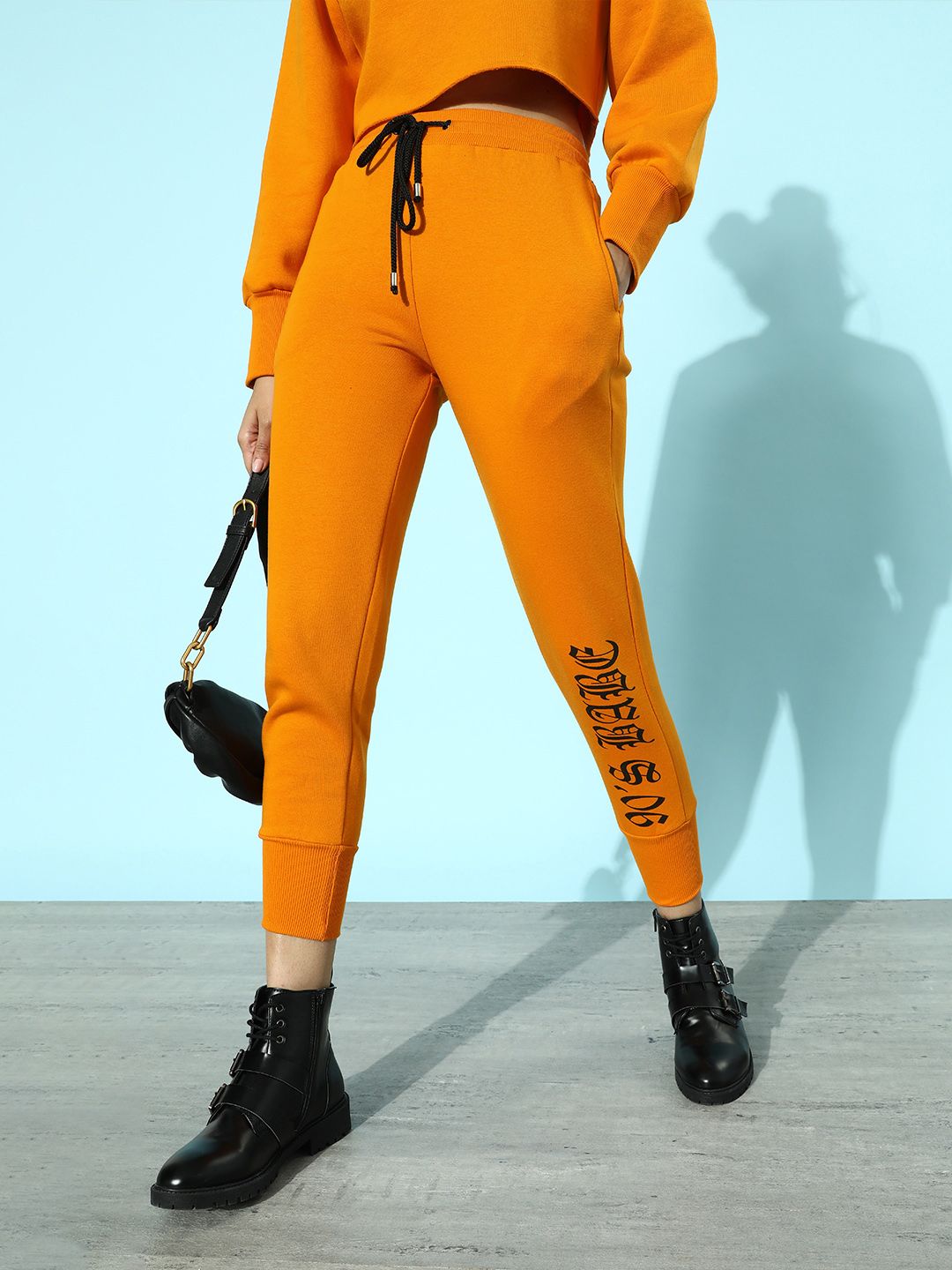 STREET 9 Women Bright Orange Typography Gym Kit Trousers Price in India