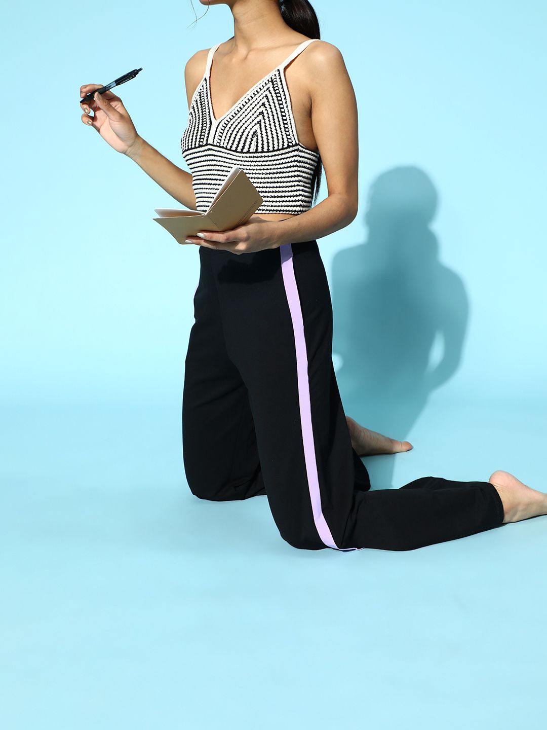 ANWAIND Women Stylish Black Striped Kick Flared Lounge Pants Price in India