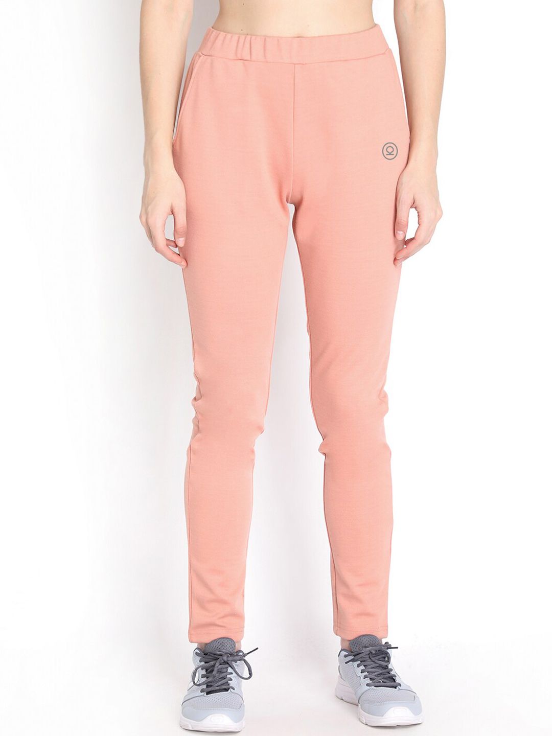 Chkokko Women Peach-Coloured Solid Track Pants Price in India