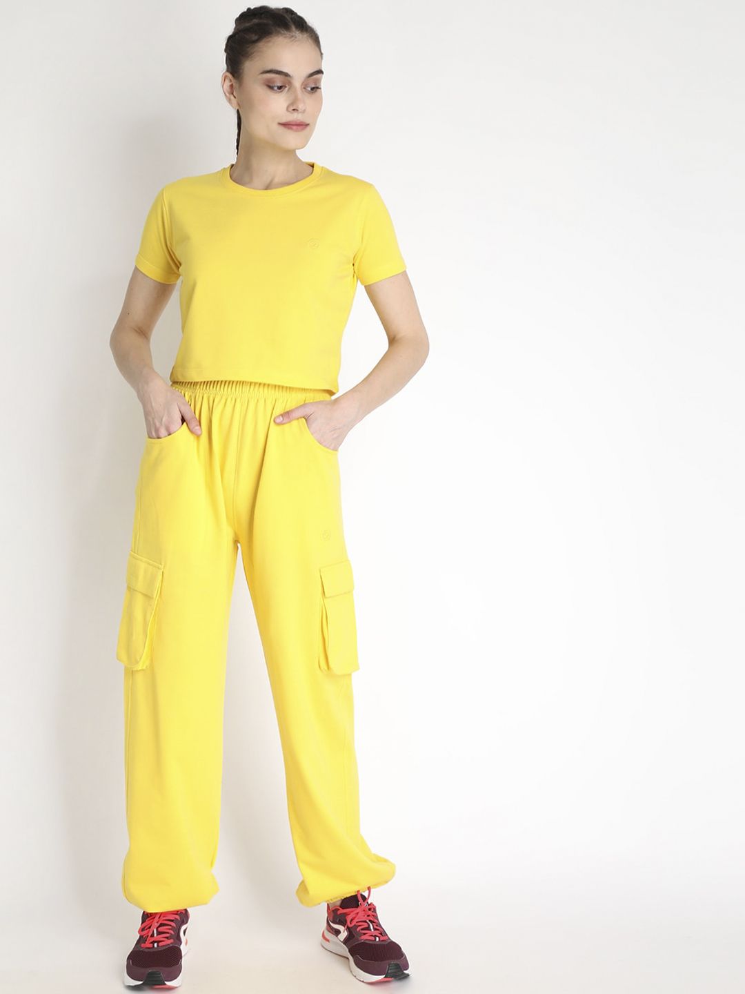 Chkokko Women Yellow Solid Regular Fit Tracksuit Price in India