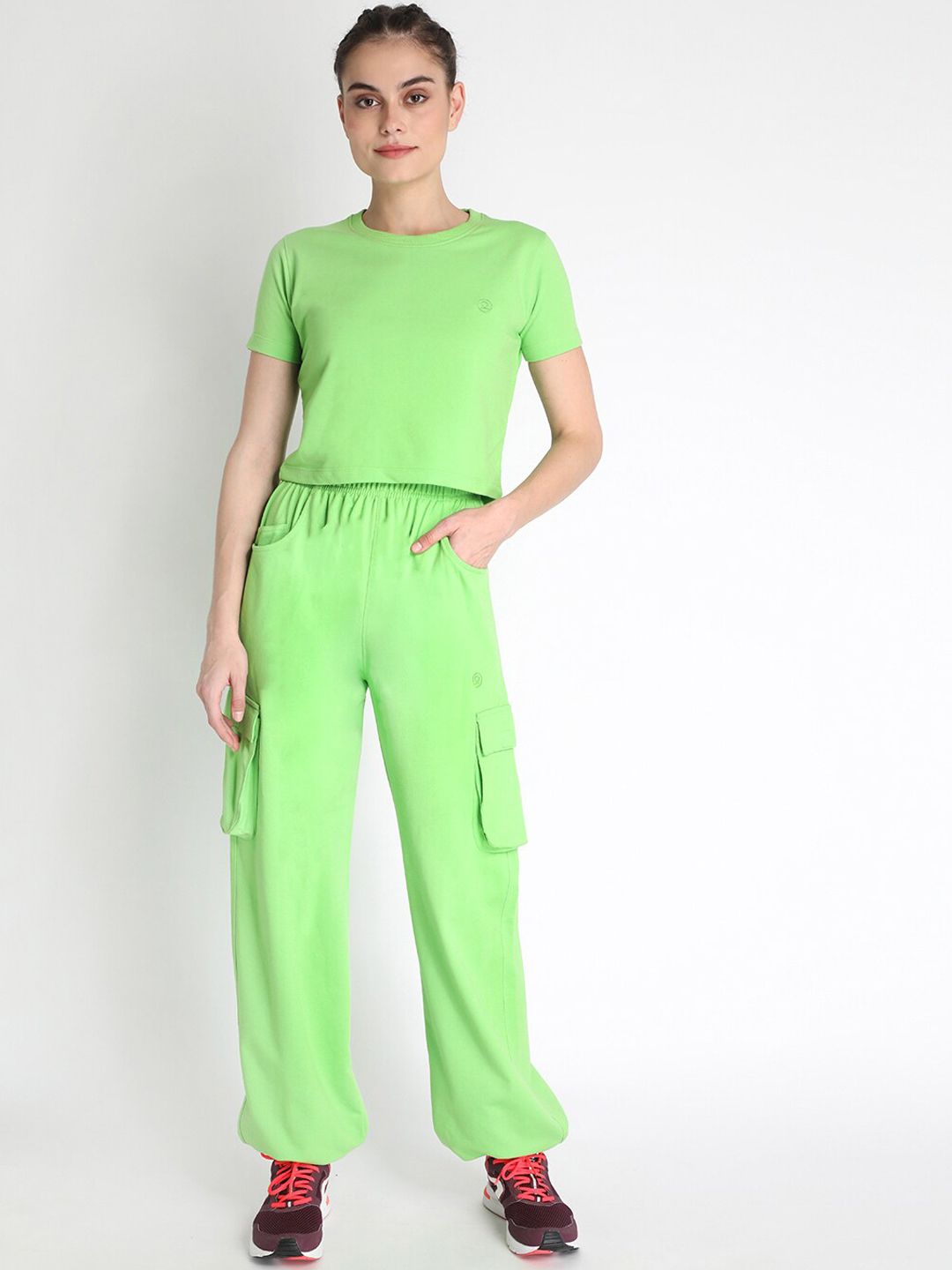 Chkokko Women Green Solid Tracksuit Price in India