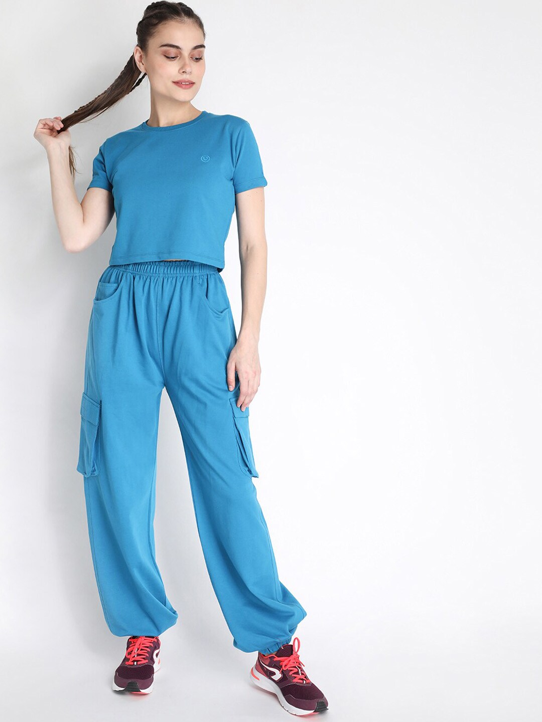 Chkokko Women Blue Solid Tracksuit Price in India
