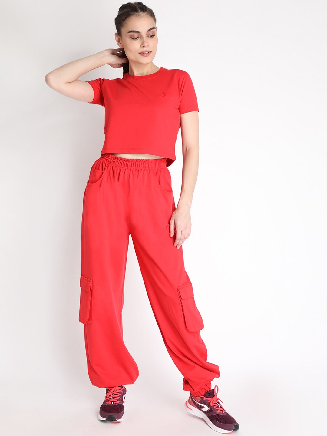 Chkokko Women Red Solid Sports Tracksuit Price in India