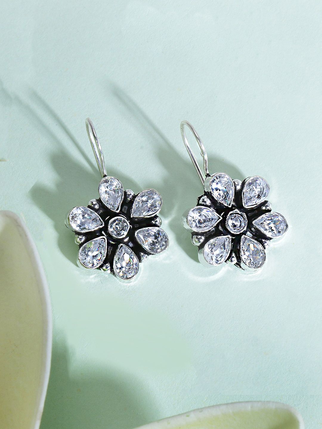 Yellow Chimes Silver-Plated Floral Stone-Studded Oxidised Drop Earrings Price in India
