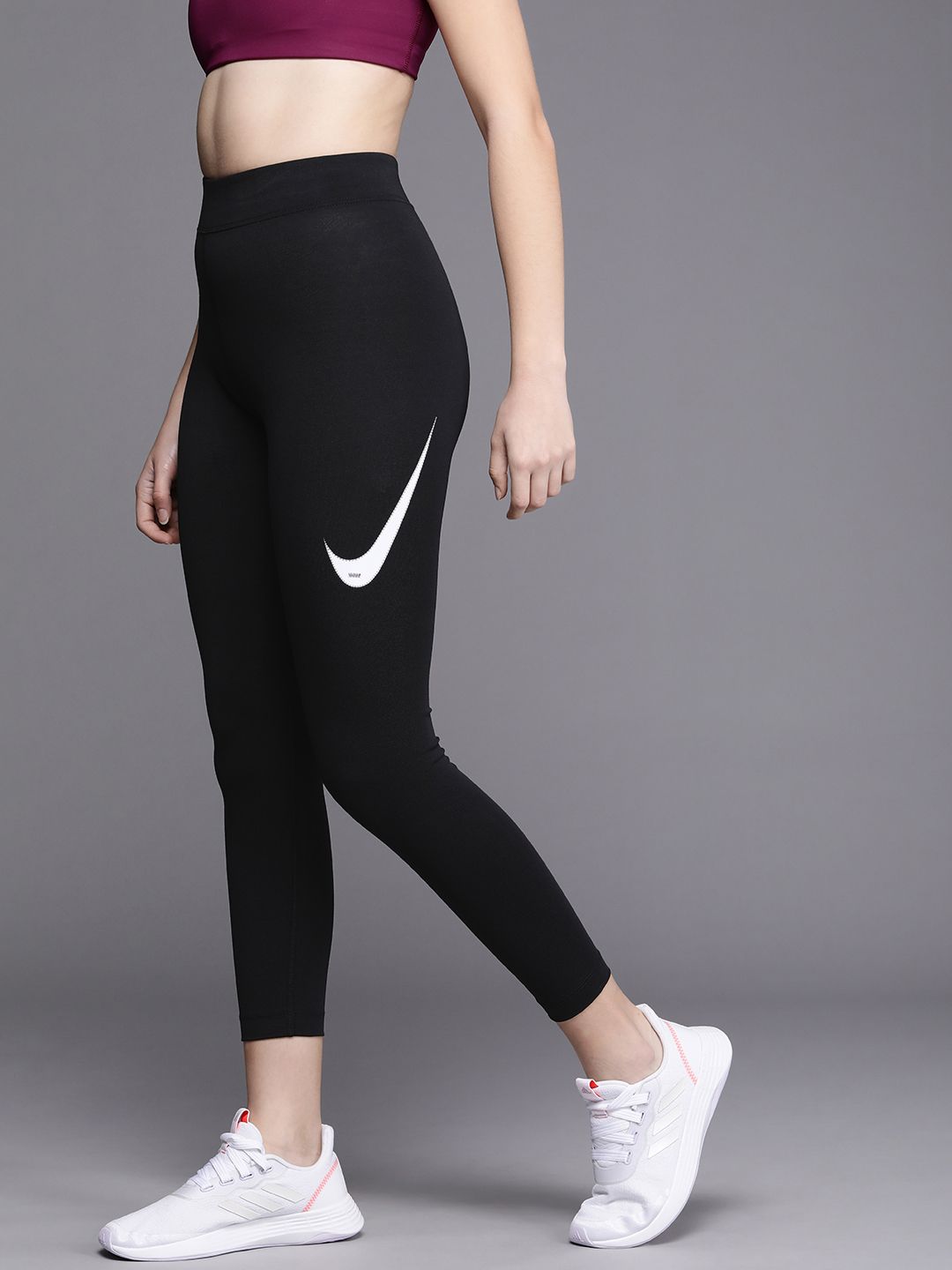 Nike Women Black Solid NSW SWSH HR Tights Price in India