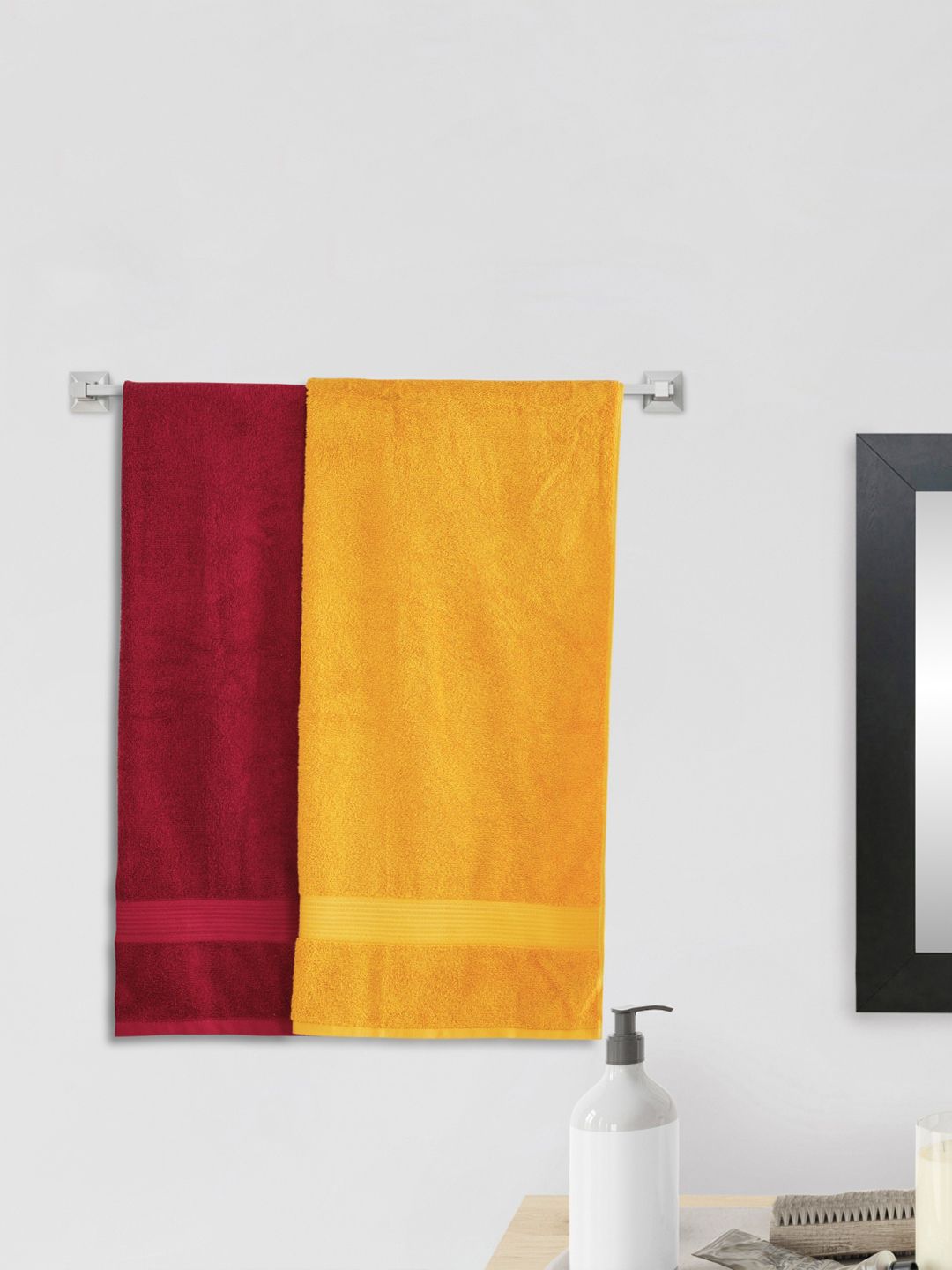 Home Centre Yellow & Maroon Solid 150 GSM Cotton Bath Towel Price in India