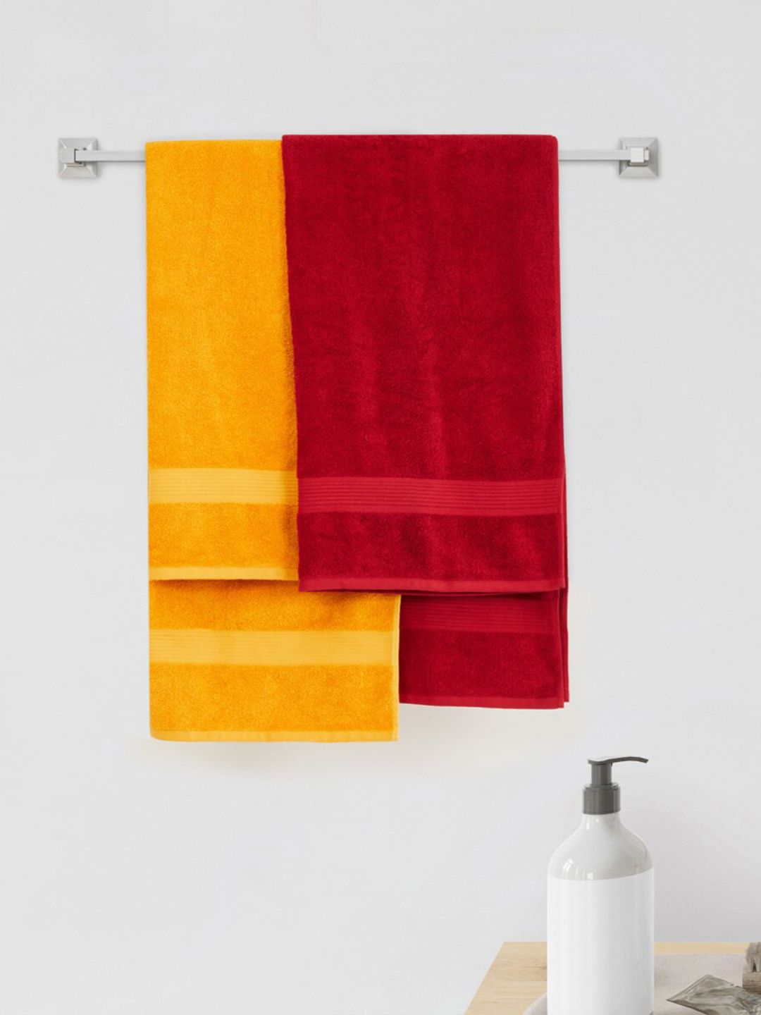 Home Centre Red & Yellow Pack of 2 Solid 150 GSM Cotton Hand Towels Price in India