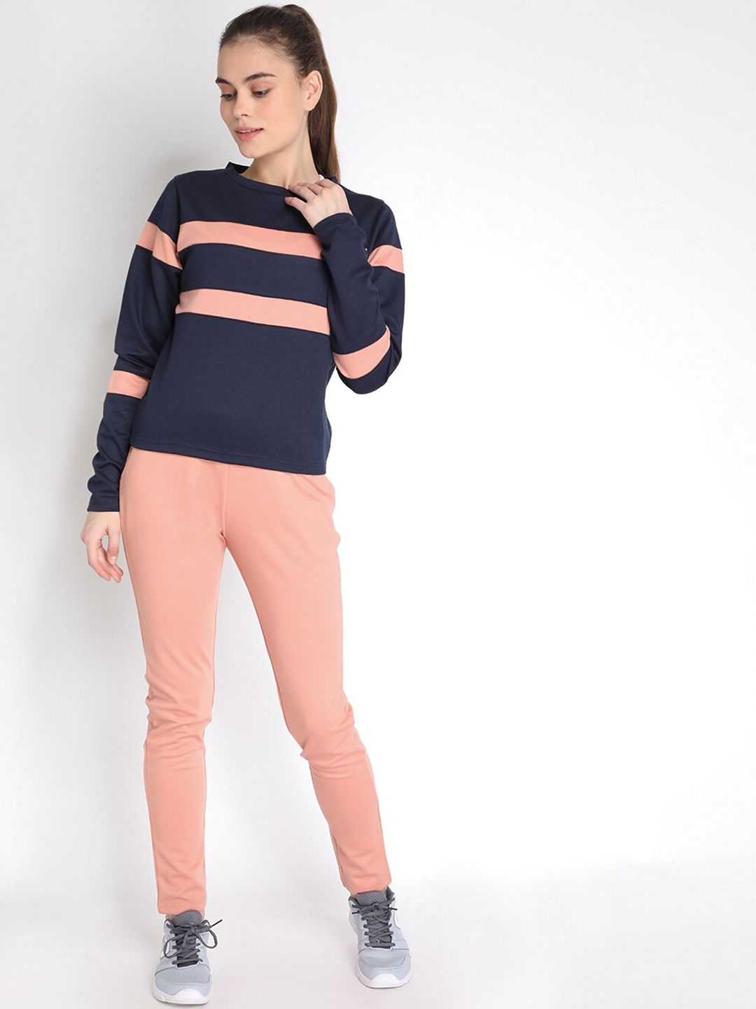 Chkokko Women Navy Blue & Pink Colourblocked Tracksuit Price in India