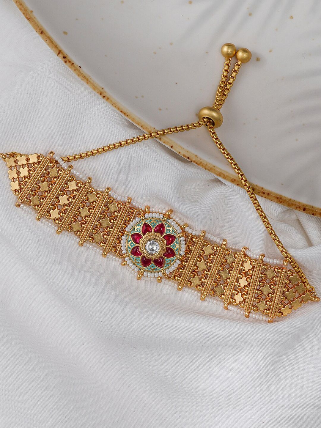 Queen Be Women Red & Gold-Toned & Plated Kundan Studded Charm Bracelet Price in India