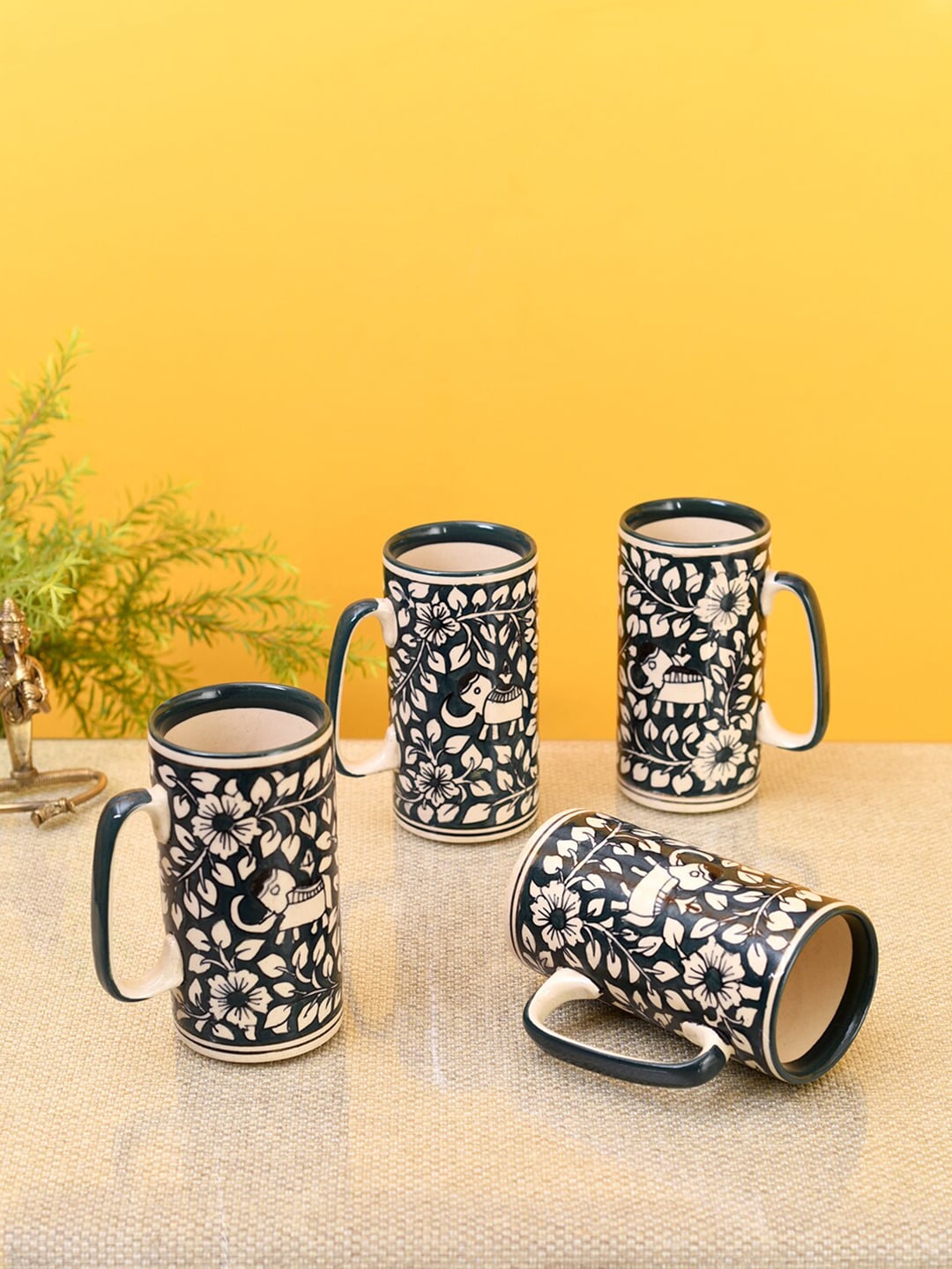 AAKRITI ART CREATIONS Blue & Cream-Coloured Set of 4 Hand Painted Ceramic Matte Cups Price in India