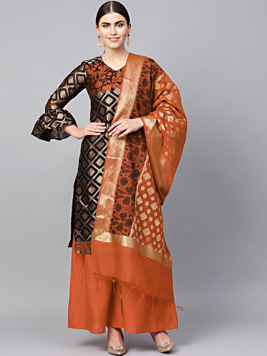Chhabra 555 Orange & Black Art Silk Unstitched Dress Material Price in India