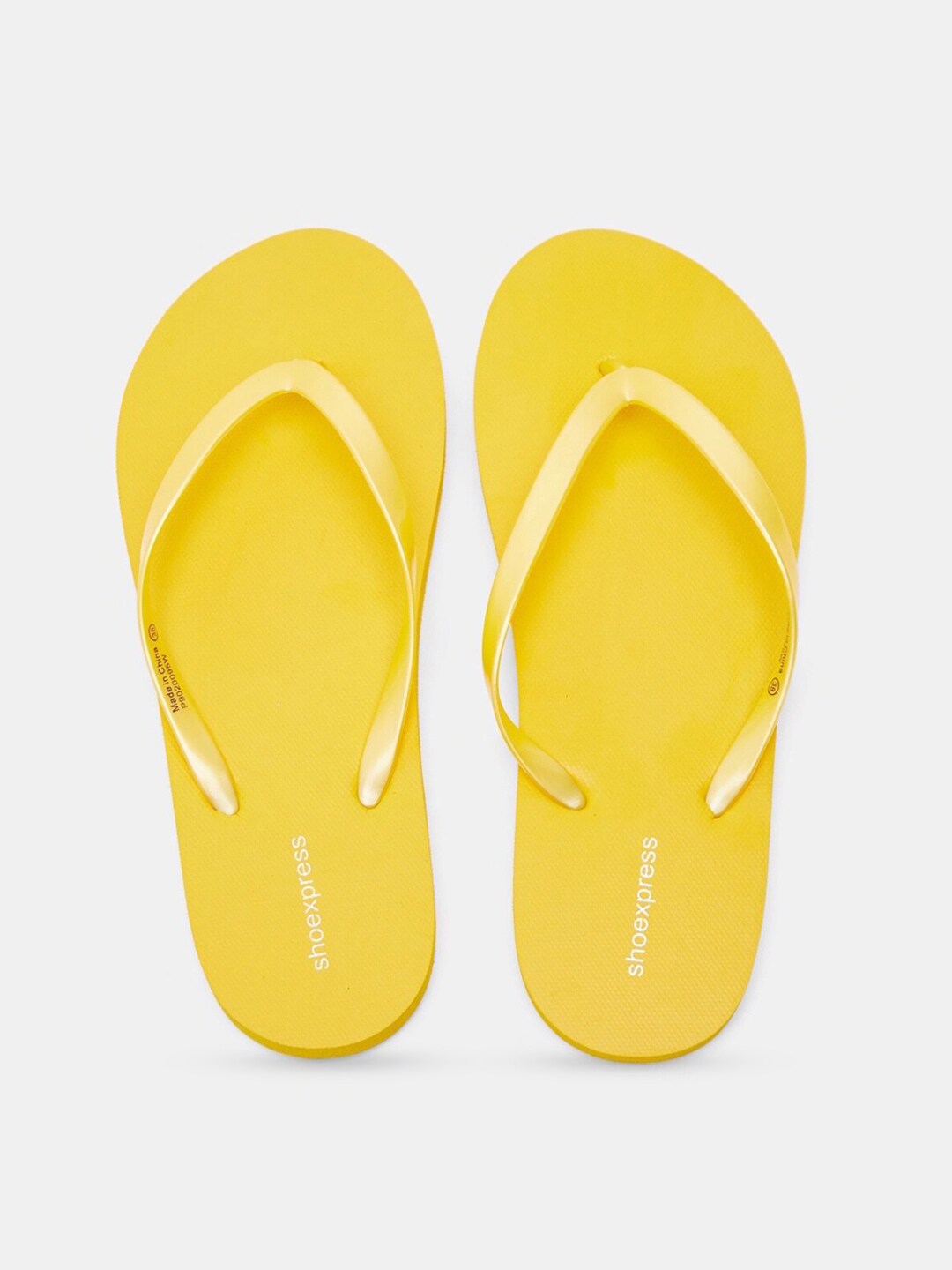 shoexpress Women Yellow Rubber Thong Flip-Flops Price in India