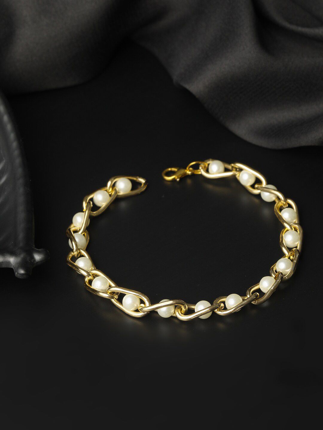 PRITA Women Gold-Toned Brass Pearls Link Bracelet Price in India