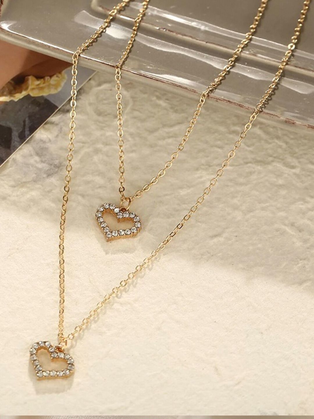 Vembley Gold-Plated & White Layered Heart Pendant Necklace Price in India