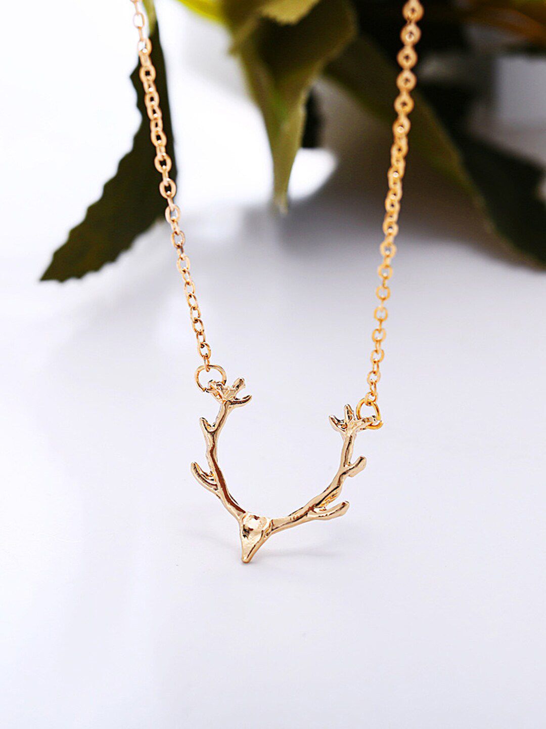 Vembley Women Gold-Plated Enamelled Reindeer Horn Necklace Price in India