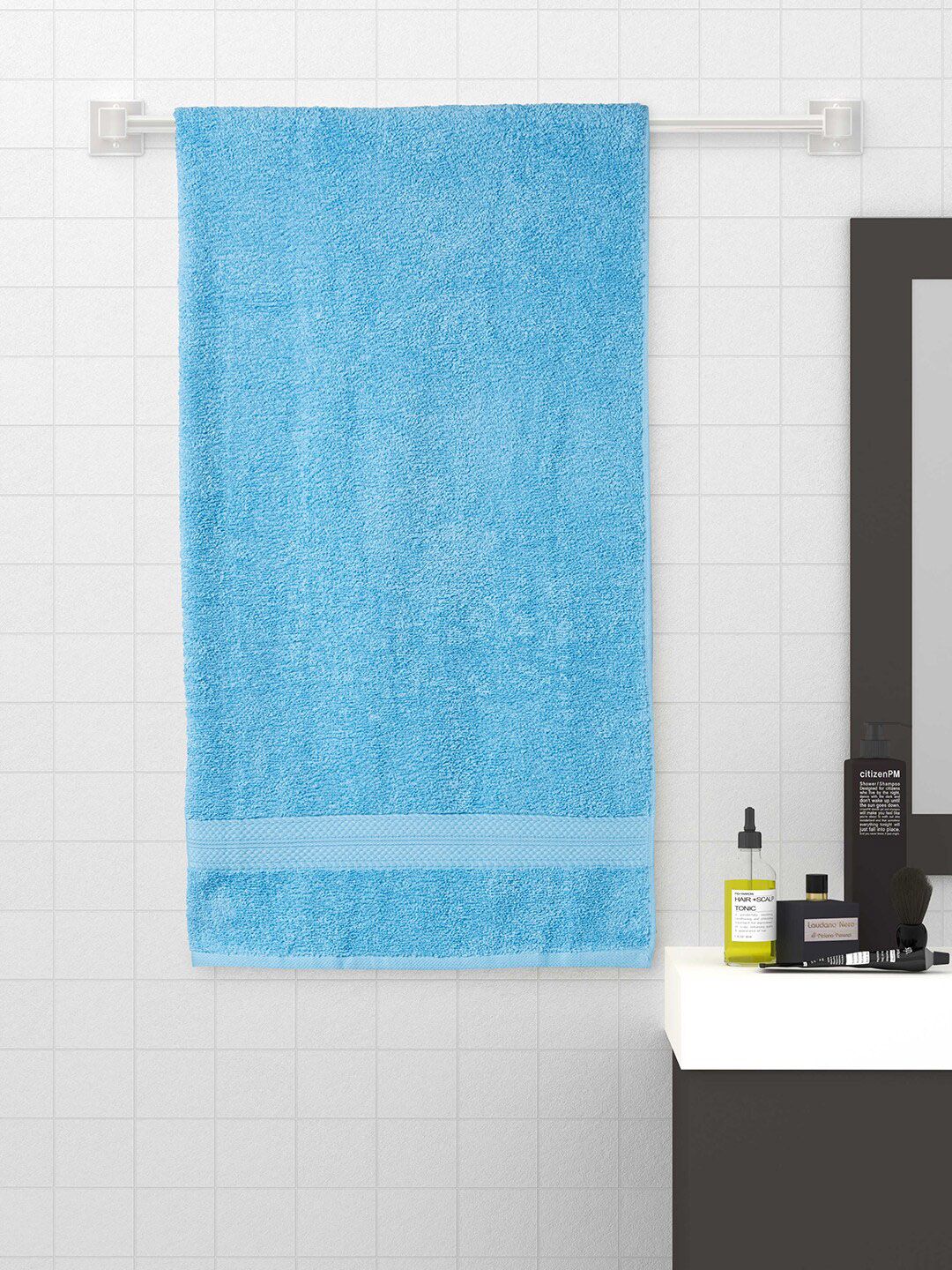 SPACES Blue Solid 450 GSM Cotton Bath Towel Price in India