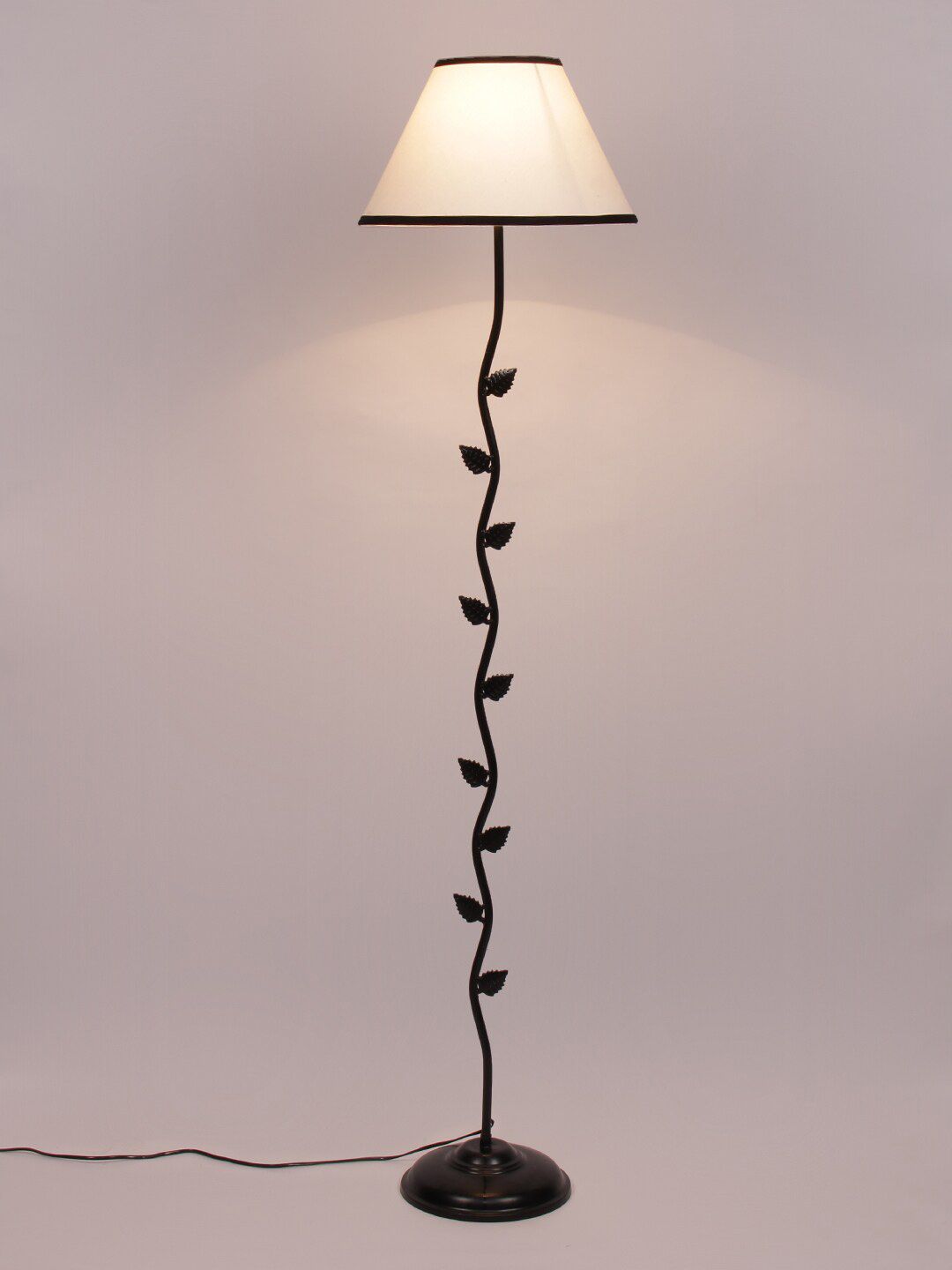 Devansh White & Black Solid Frustum Leaf Floor Lamp Price in India