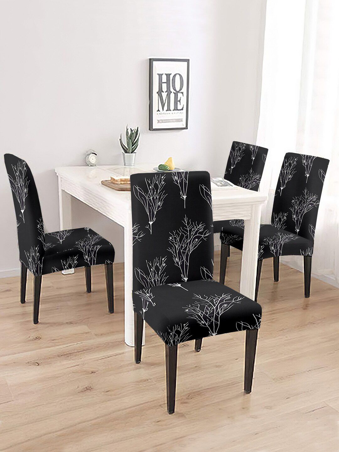 Aura Set Of 4 Black & White Printed Chair Covers Price in India