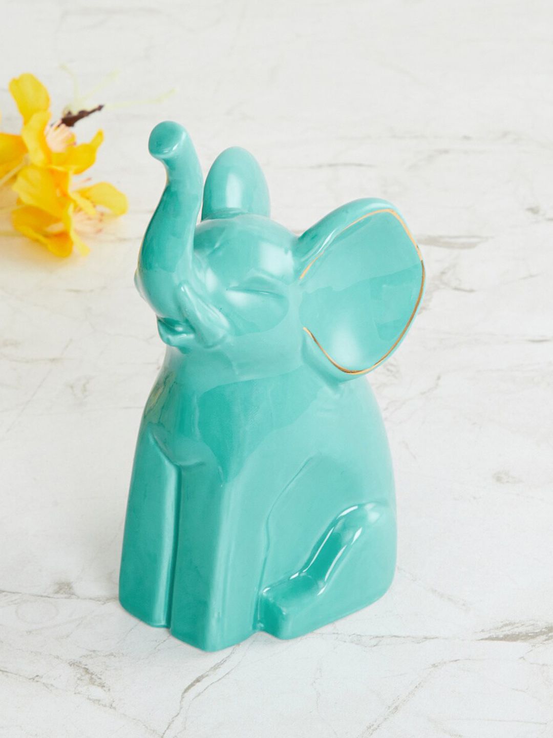 Home Centre Teal Ceramic Sitting Elephant Figurine Showpieces Price in India