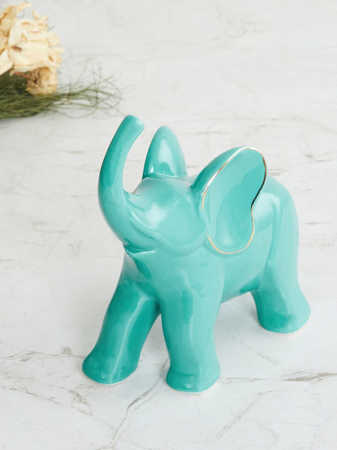 Home Centre Blue Ceramic Elephant Showpieces Price in India